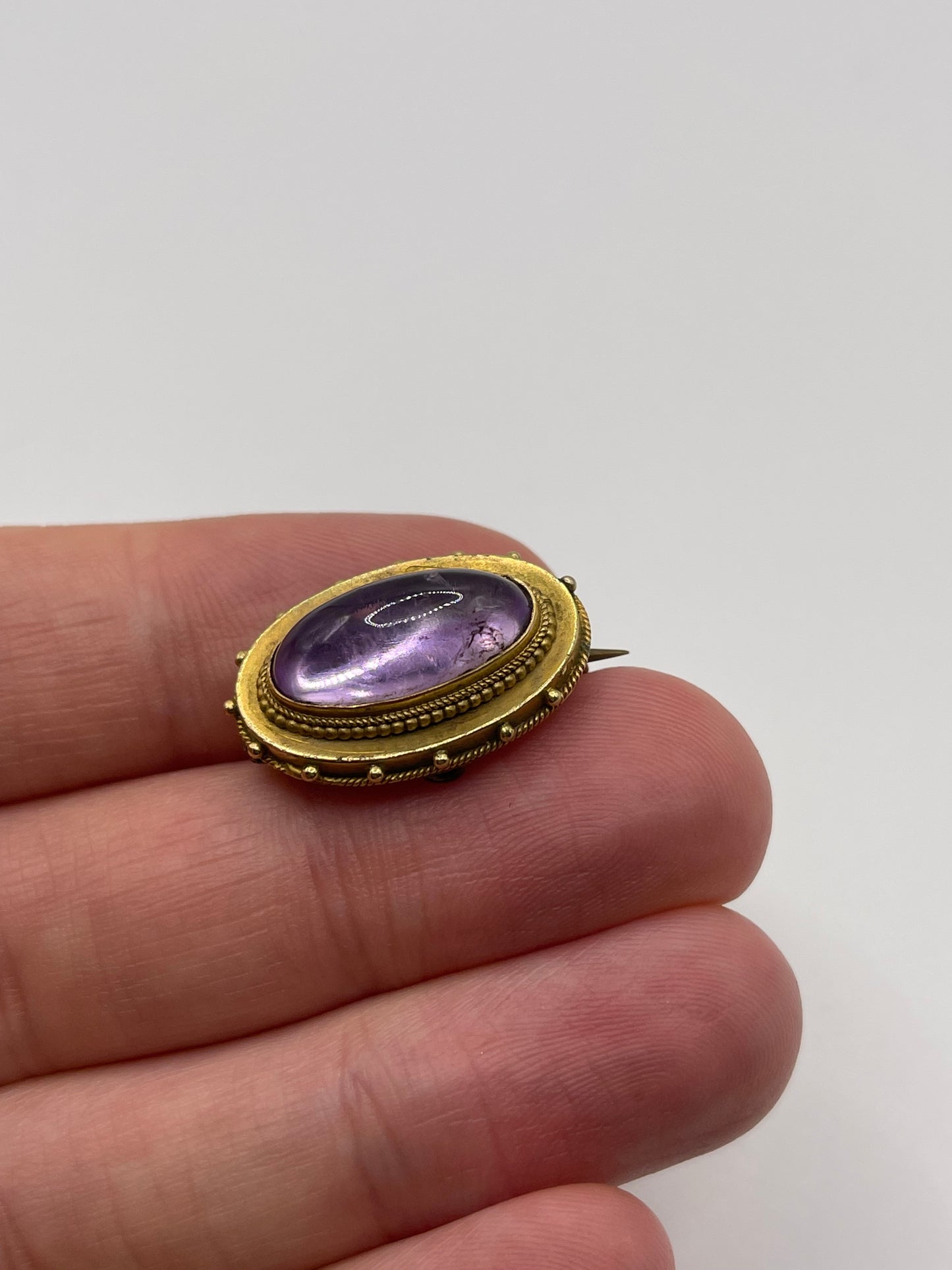 Antique 15ct gold cabochon amethyst brooch