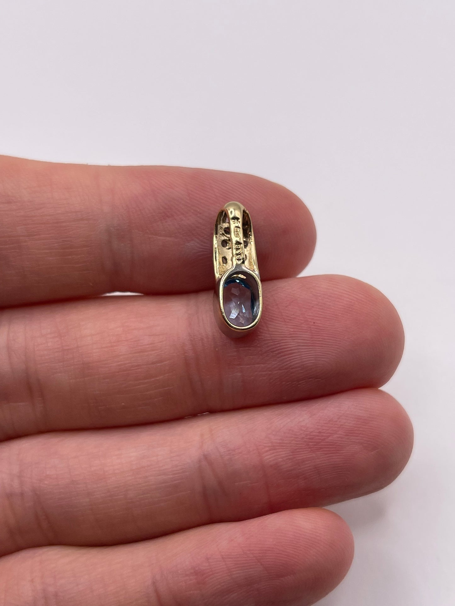 9ct gold topaz and diamond pendant