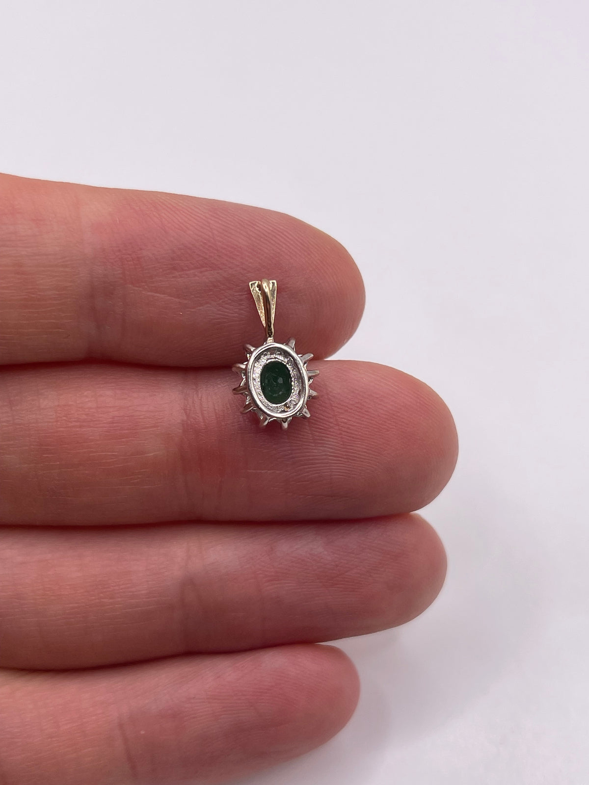 9ct gold emerald and diamond pendant