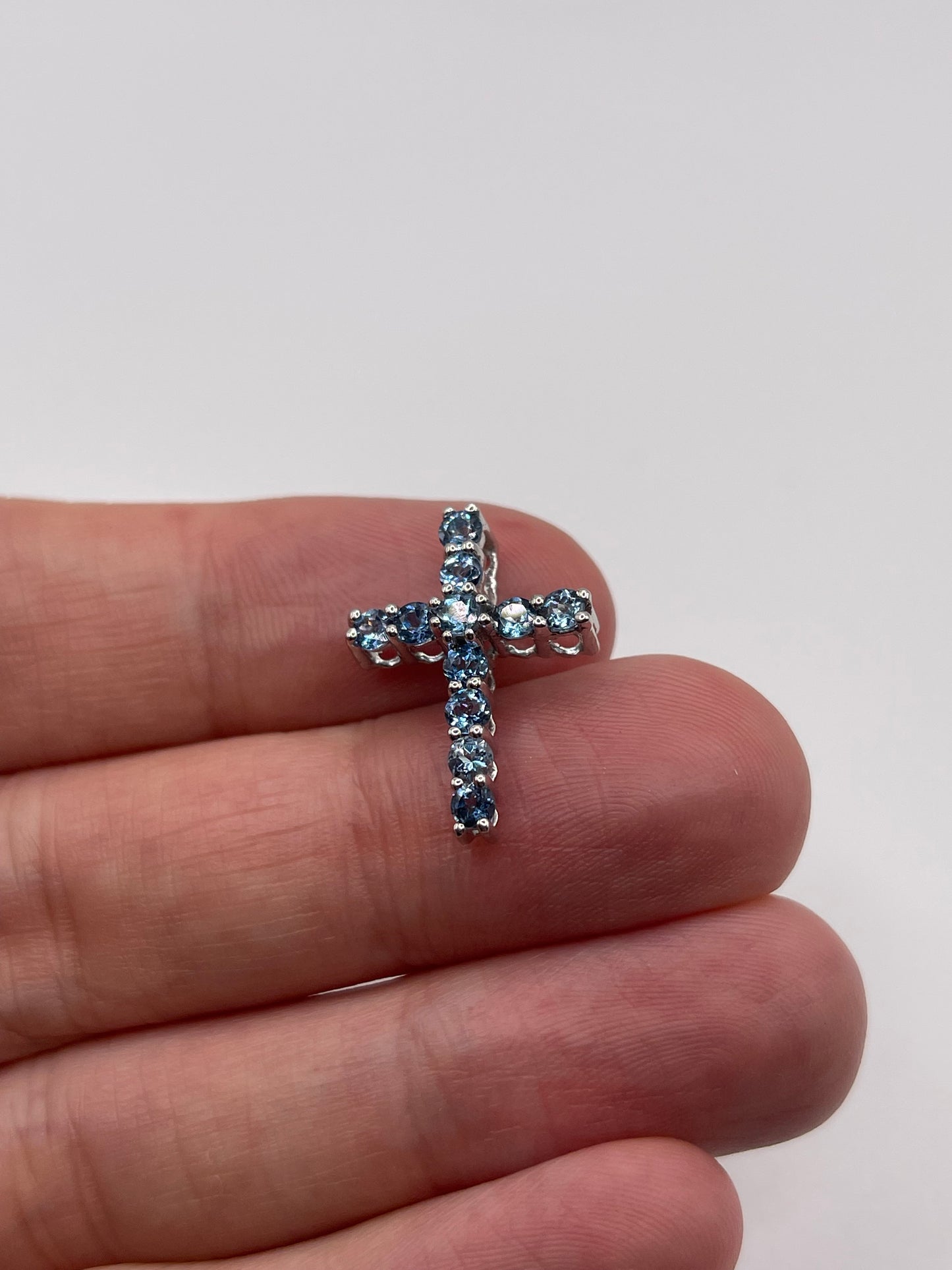 9ct white gold blue topaz cross pendant