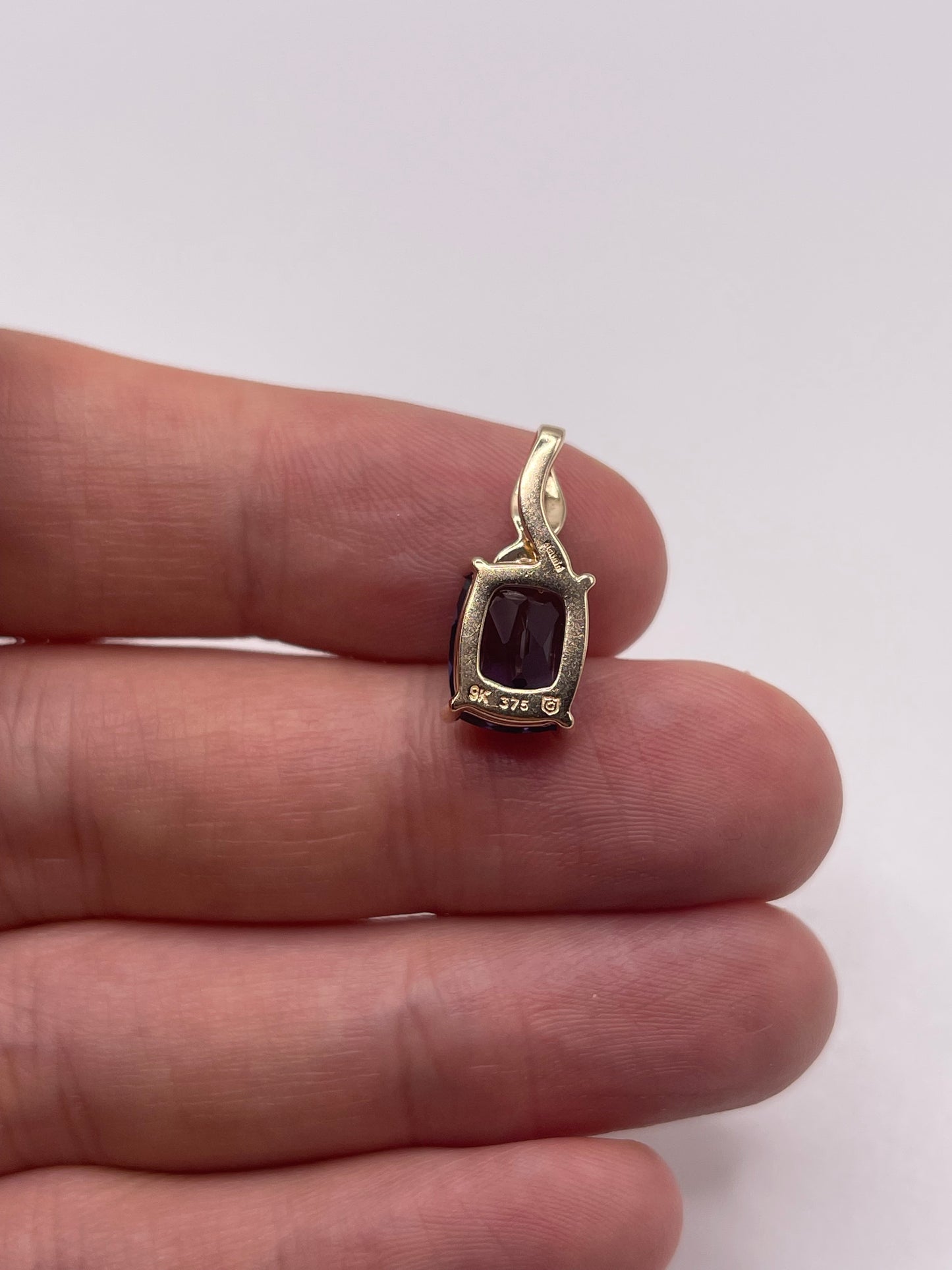 9ct gold iolite and diamond pendant