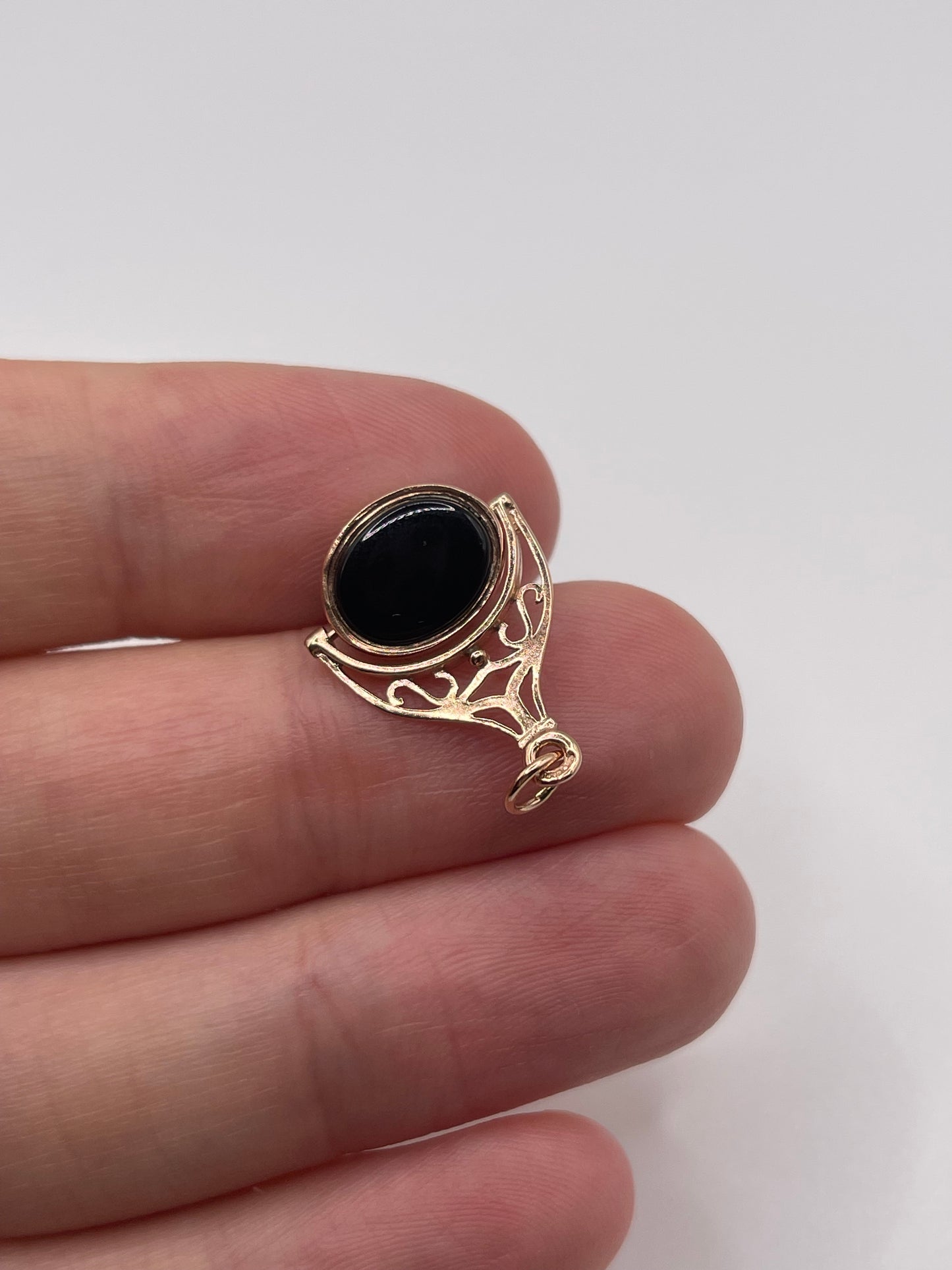 9ct rose gold onyx spinning fob pendant