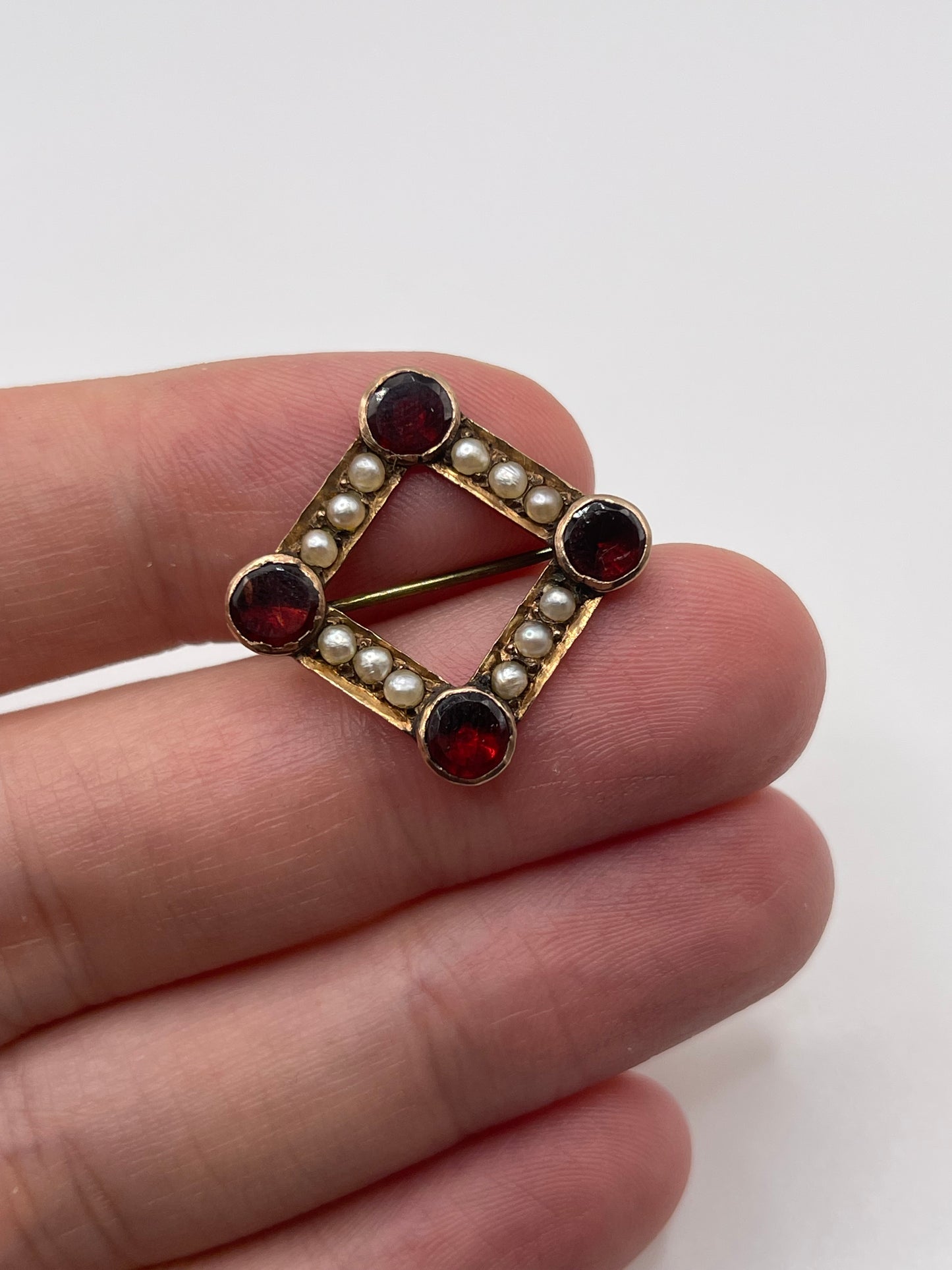 Antique 9ct rose gold garnet and pearl brooch
