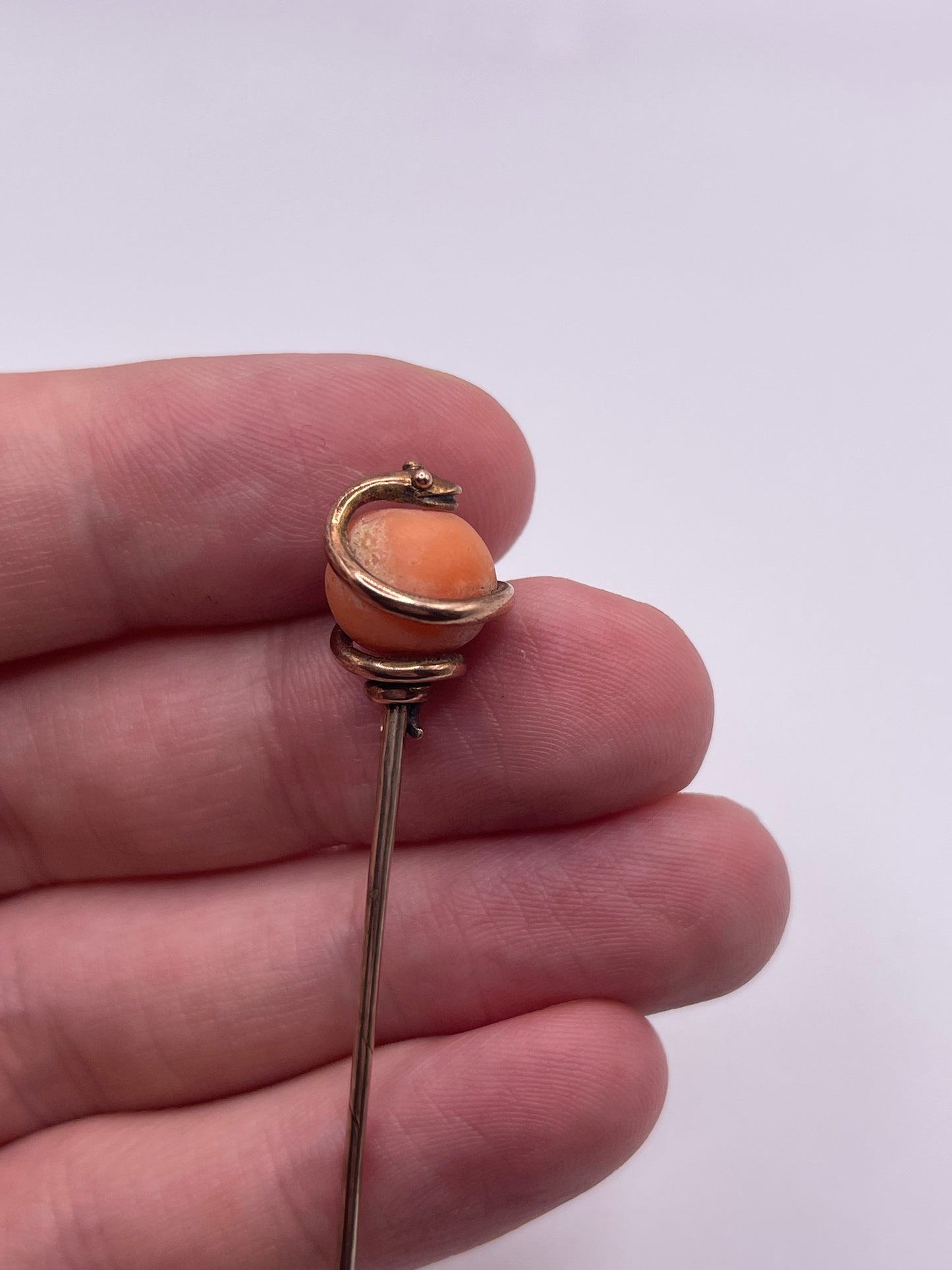 Antique 9ct gold coral snake pin