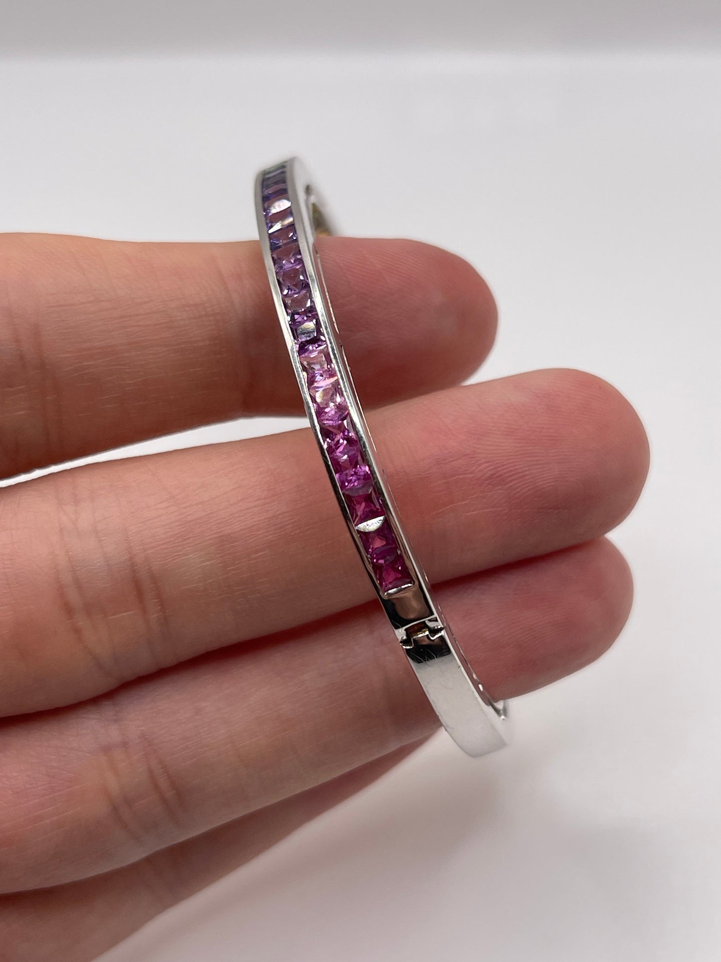 Heavy 9ct white gold multi coloured sapphire bangle