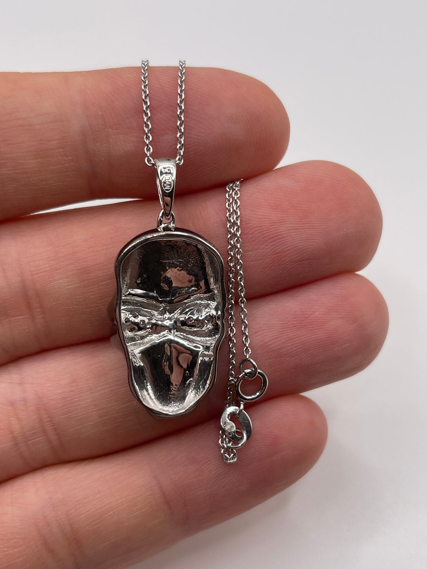 9ct white gold diamond skull necklace