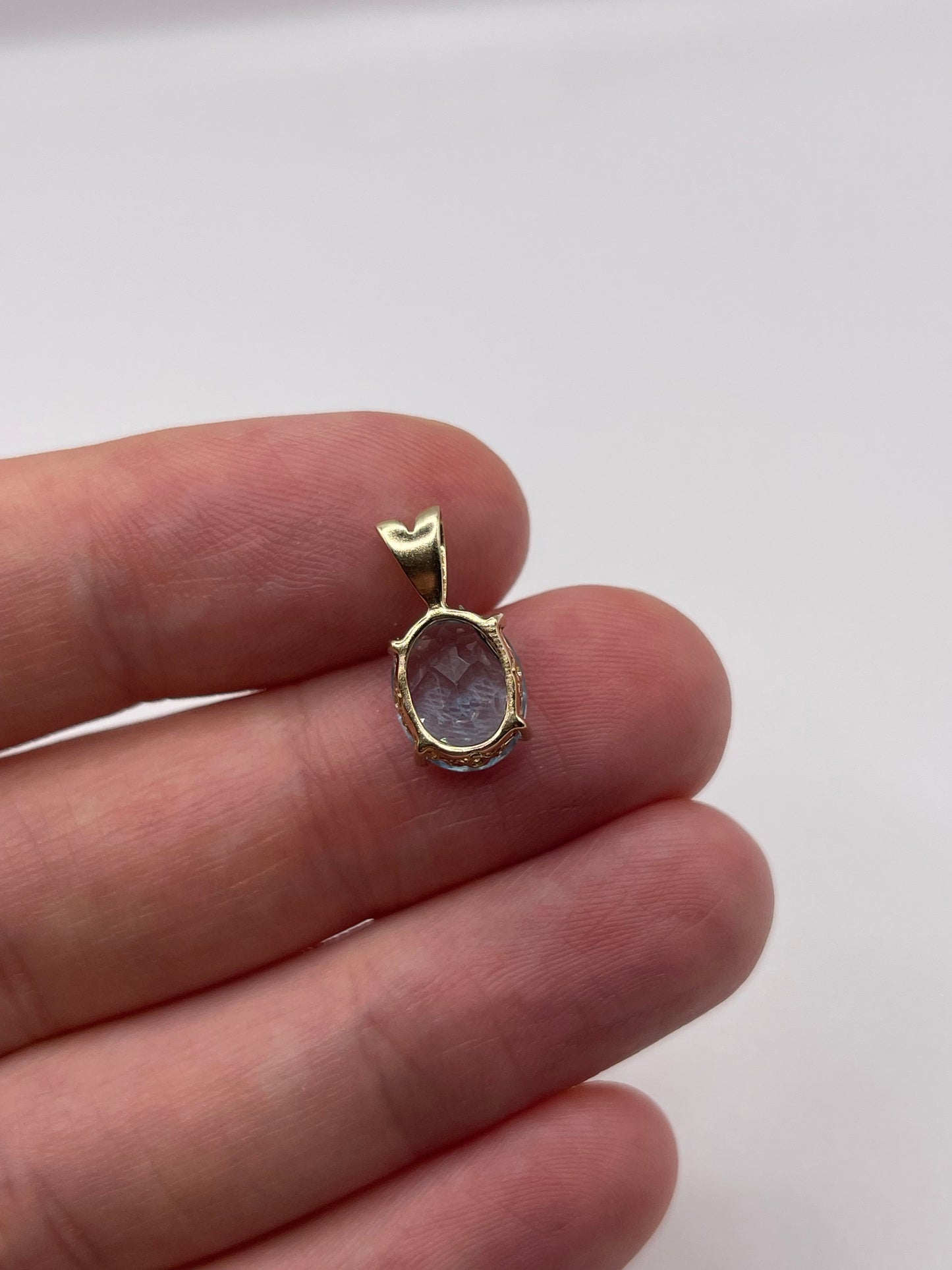 9ct gold topaz and diamond pendant