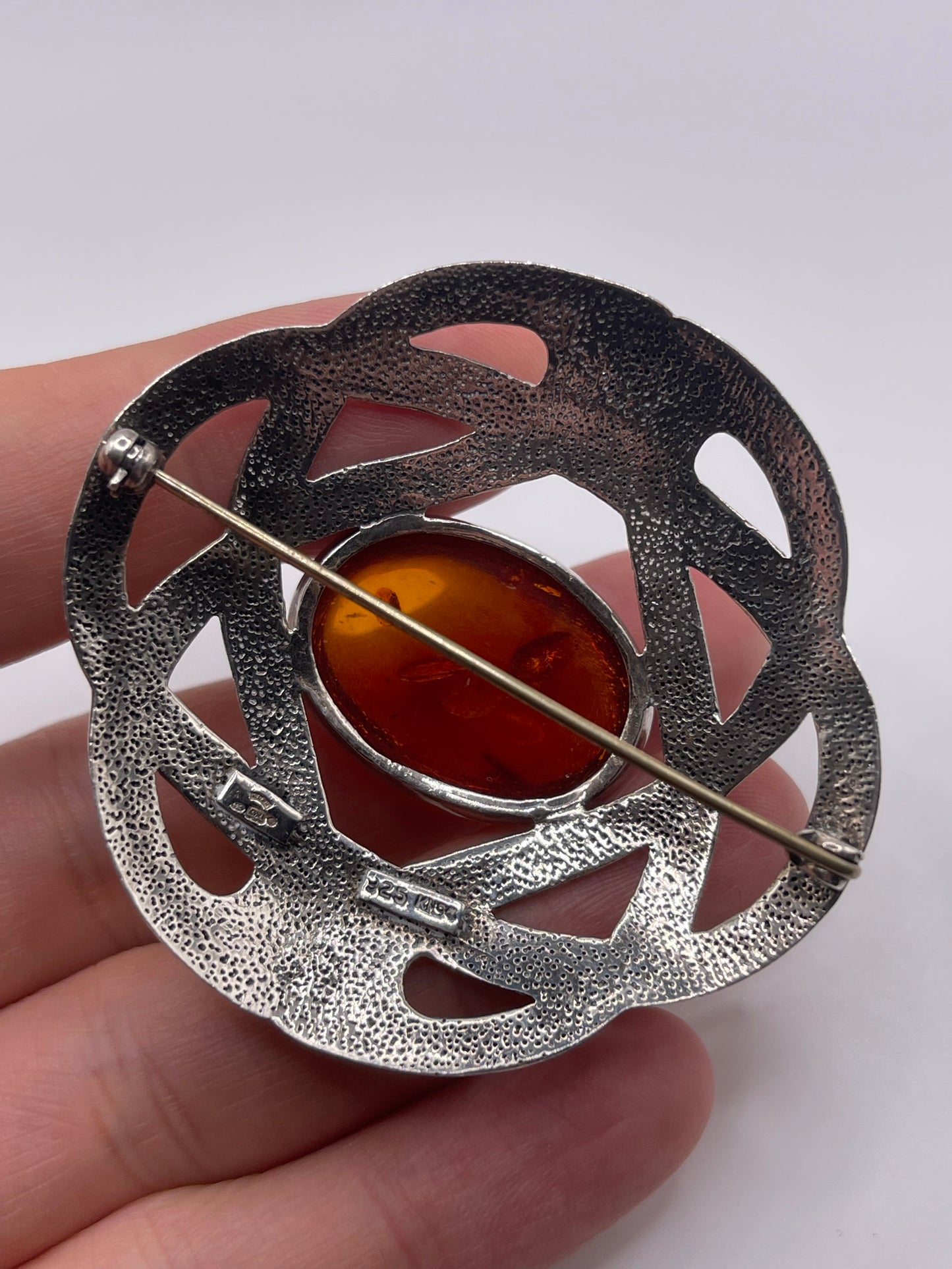 Silver amber brooch