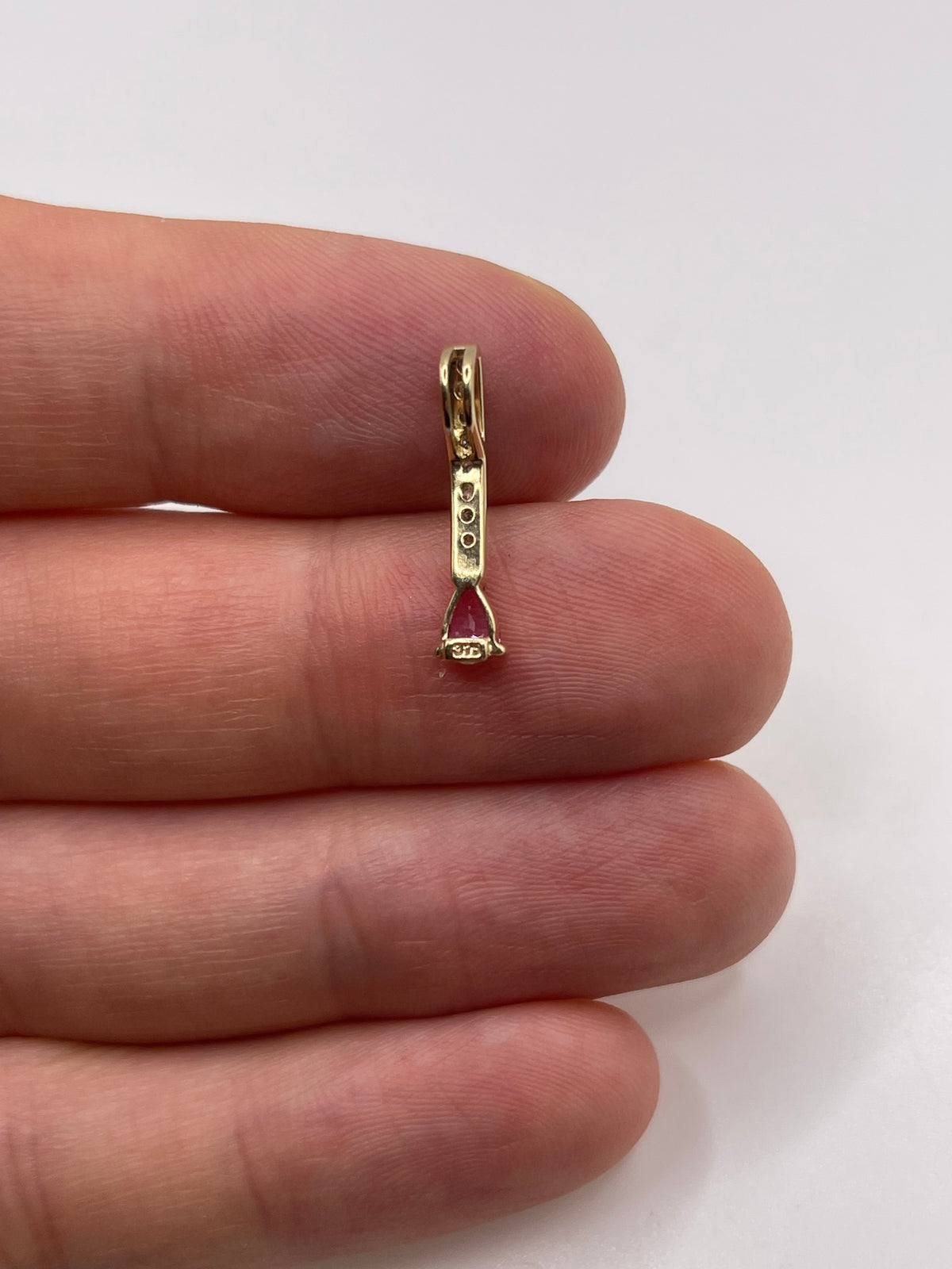 9ct gold pink sapphire and diamond pendant