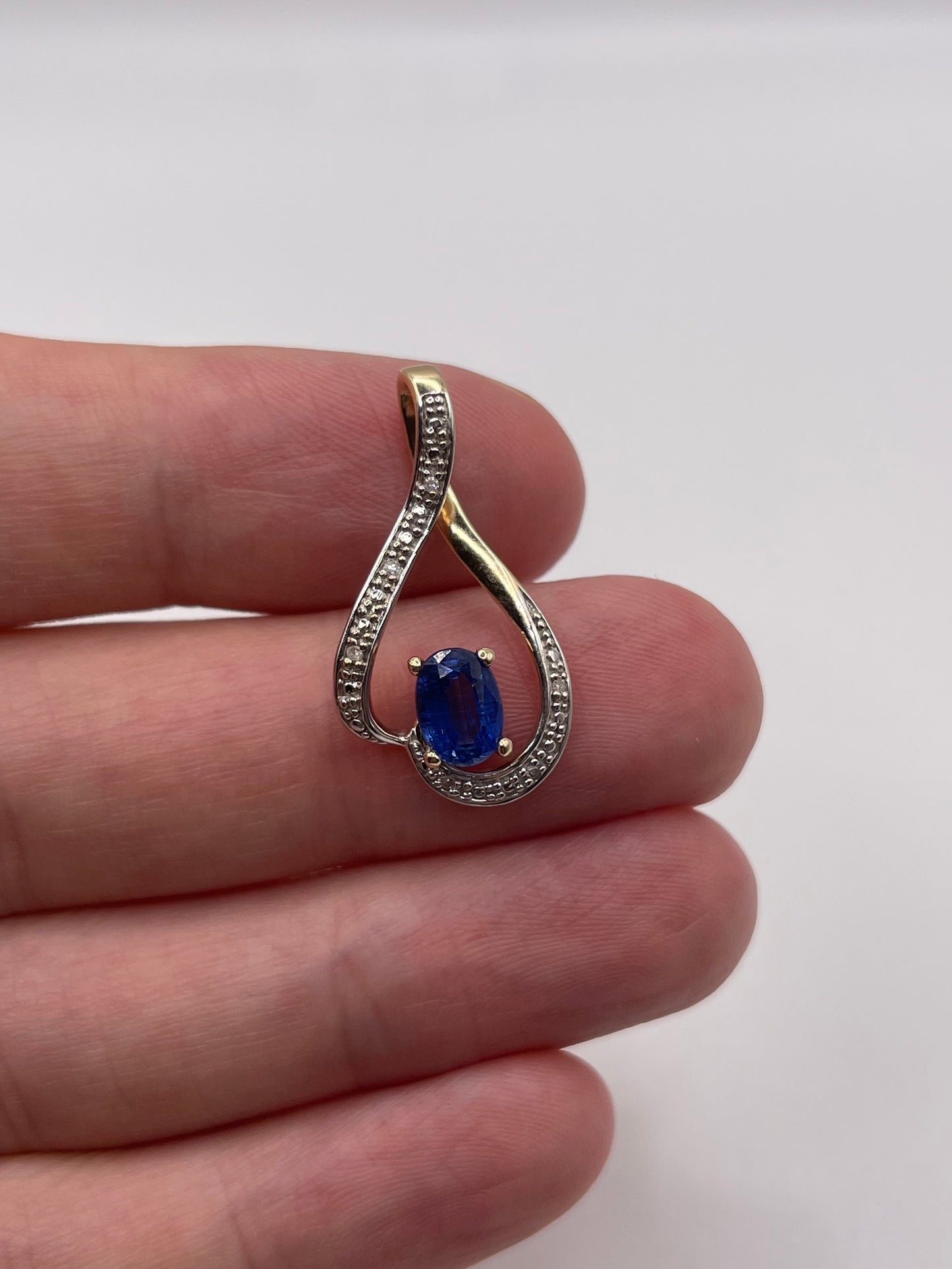 9ct gold kyanite and diamond pendant