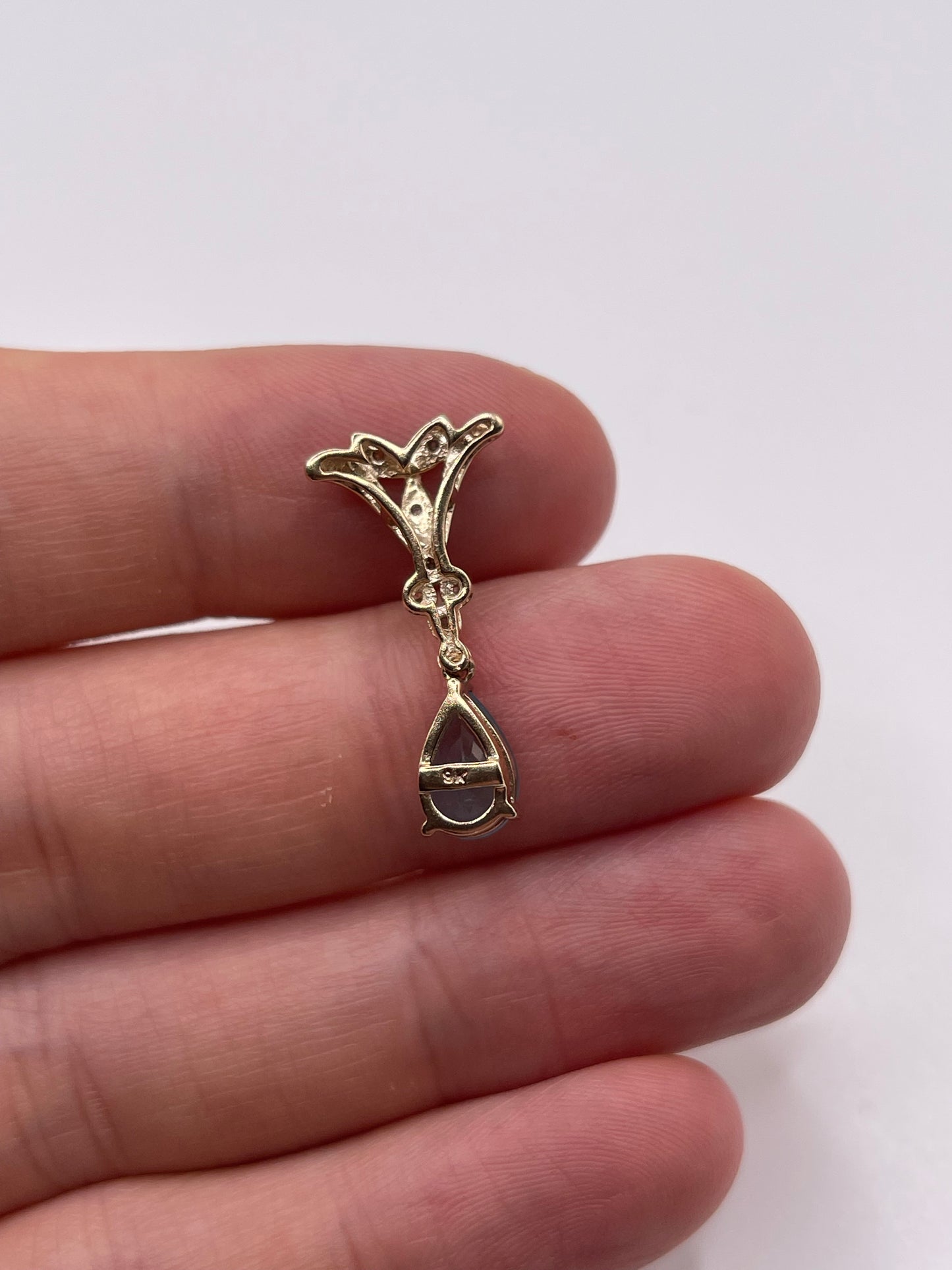 9ct gold topaz and diamond pendant