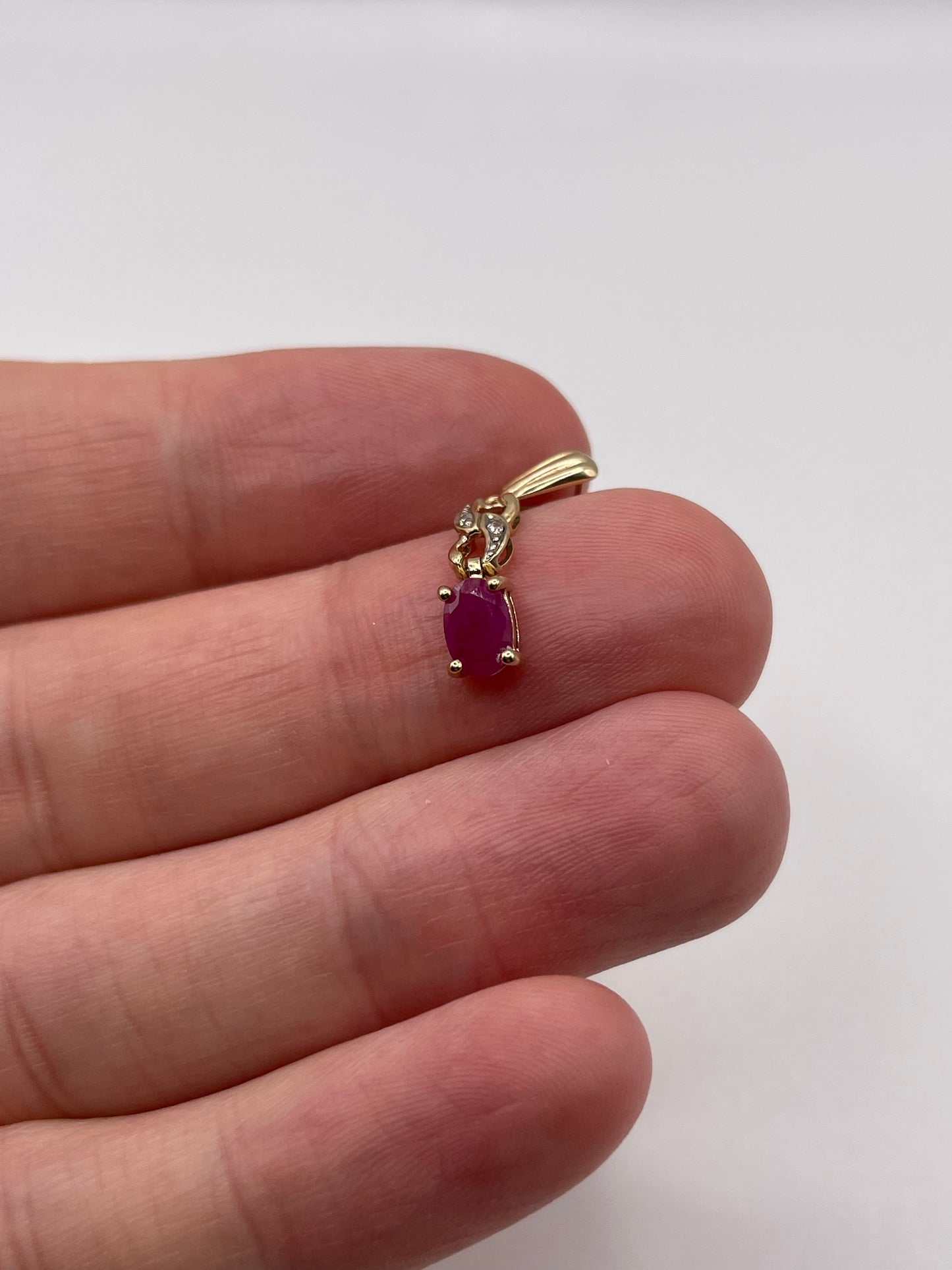 9ct gold ruby and diamond pendant