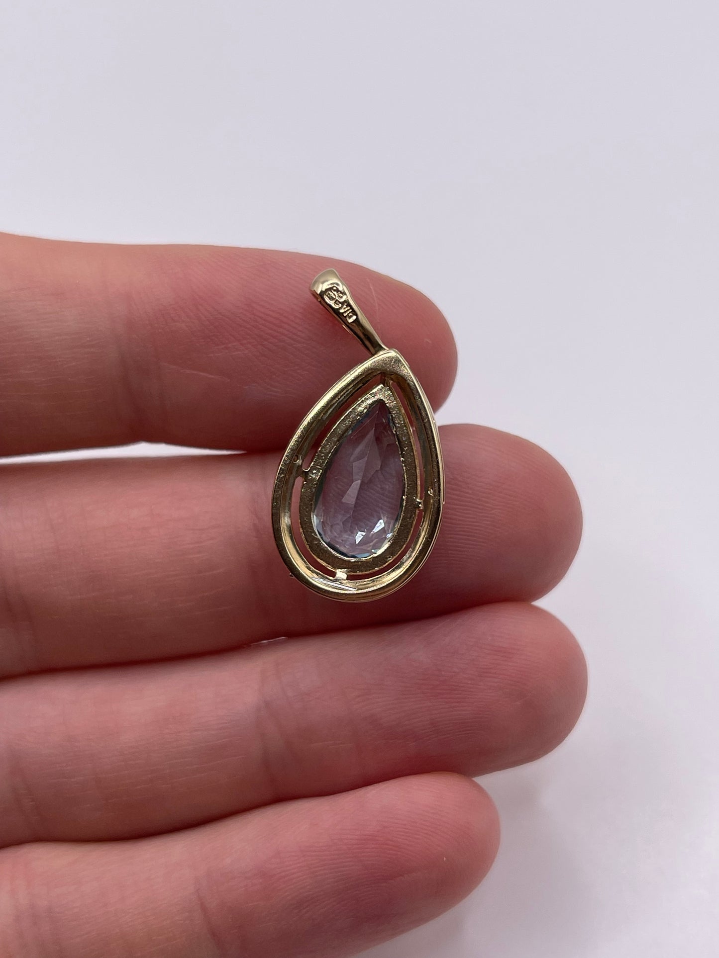 9ct gold topaz and diamond pendant