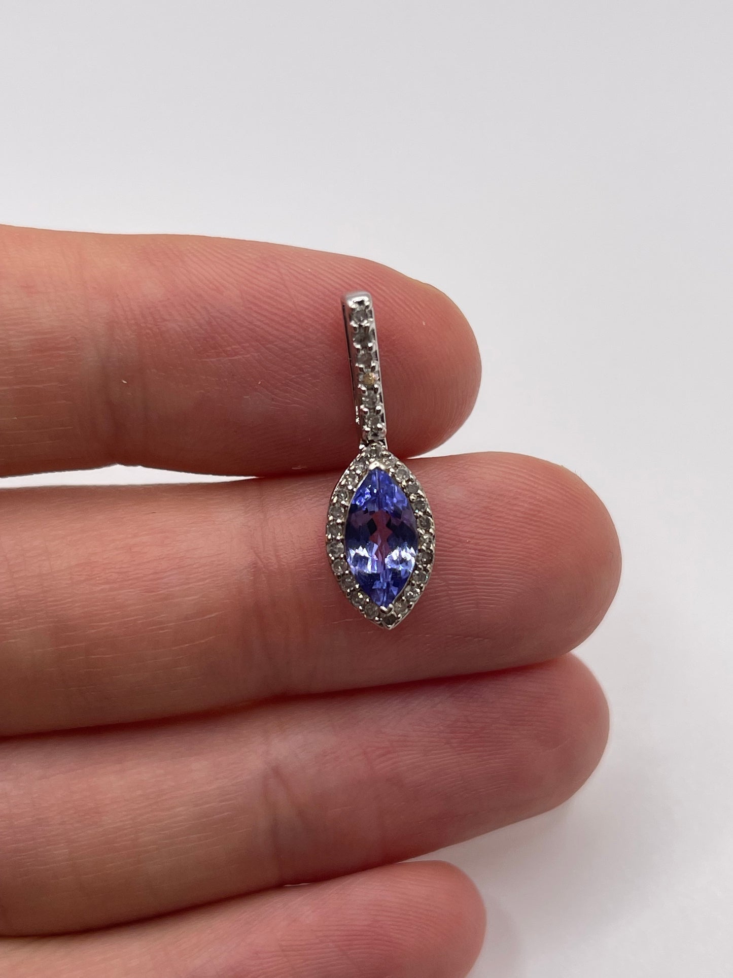9ct white gold tanzanite and diamond pendant