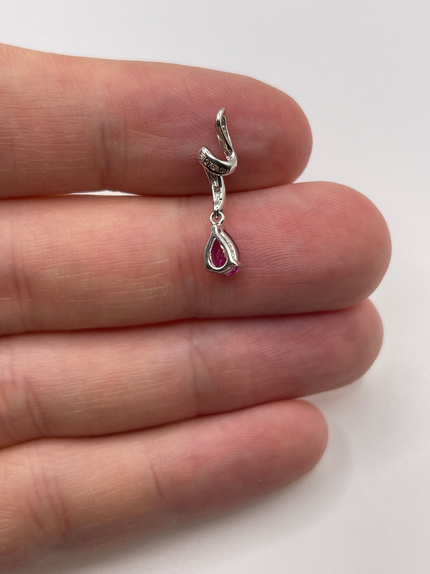 9ct white gold pink topaz and diamond pendant