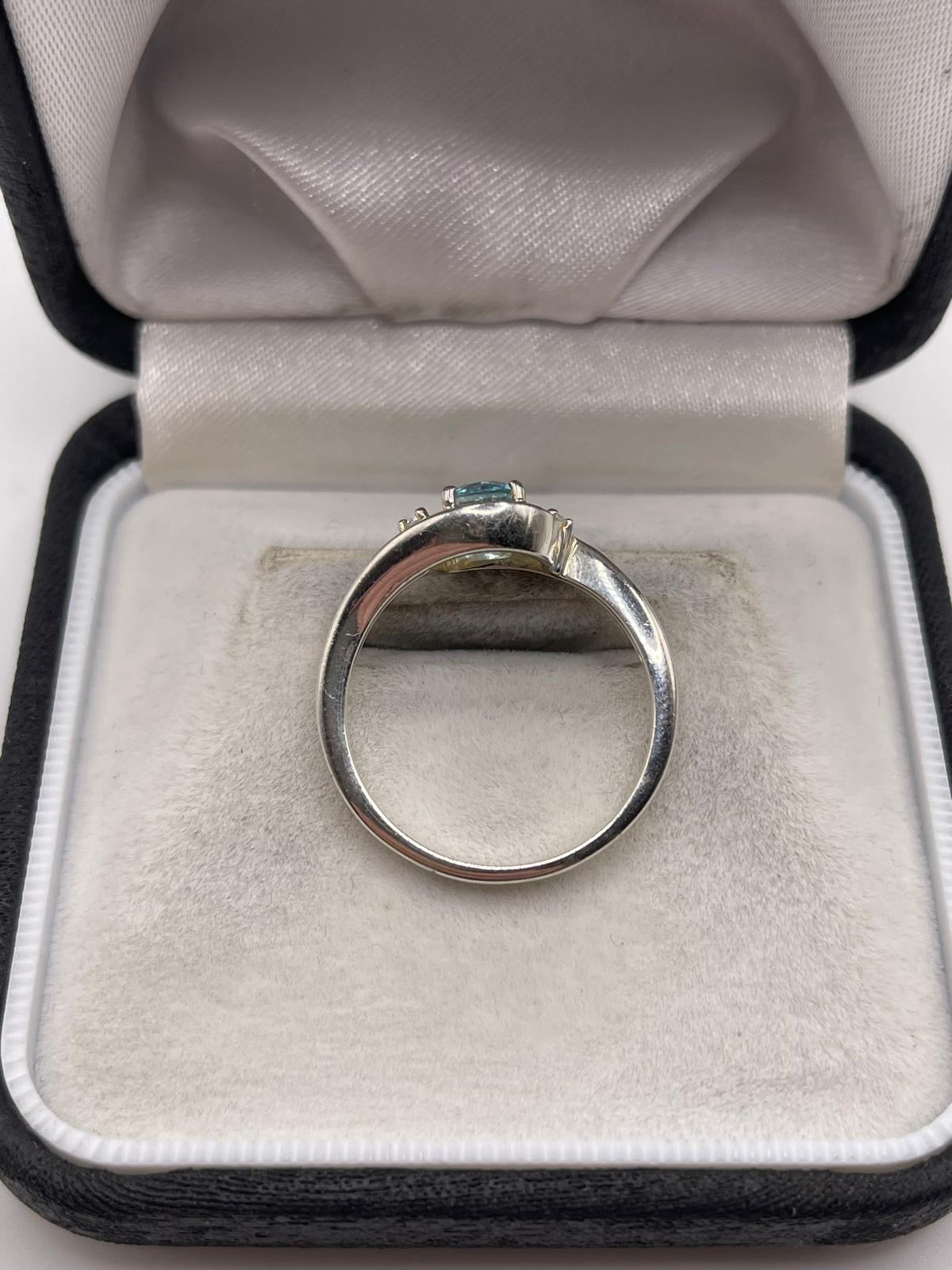 Silver topaz ring