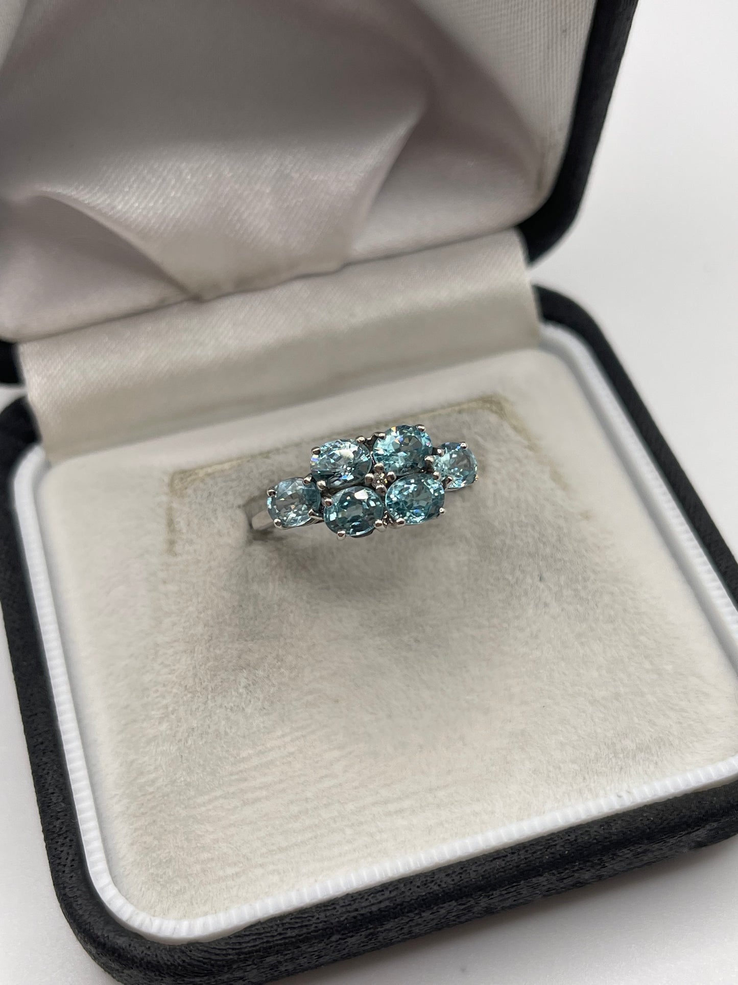9ct white gold blue zircon and diamond ring
