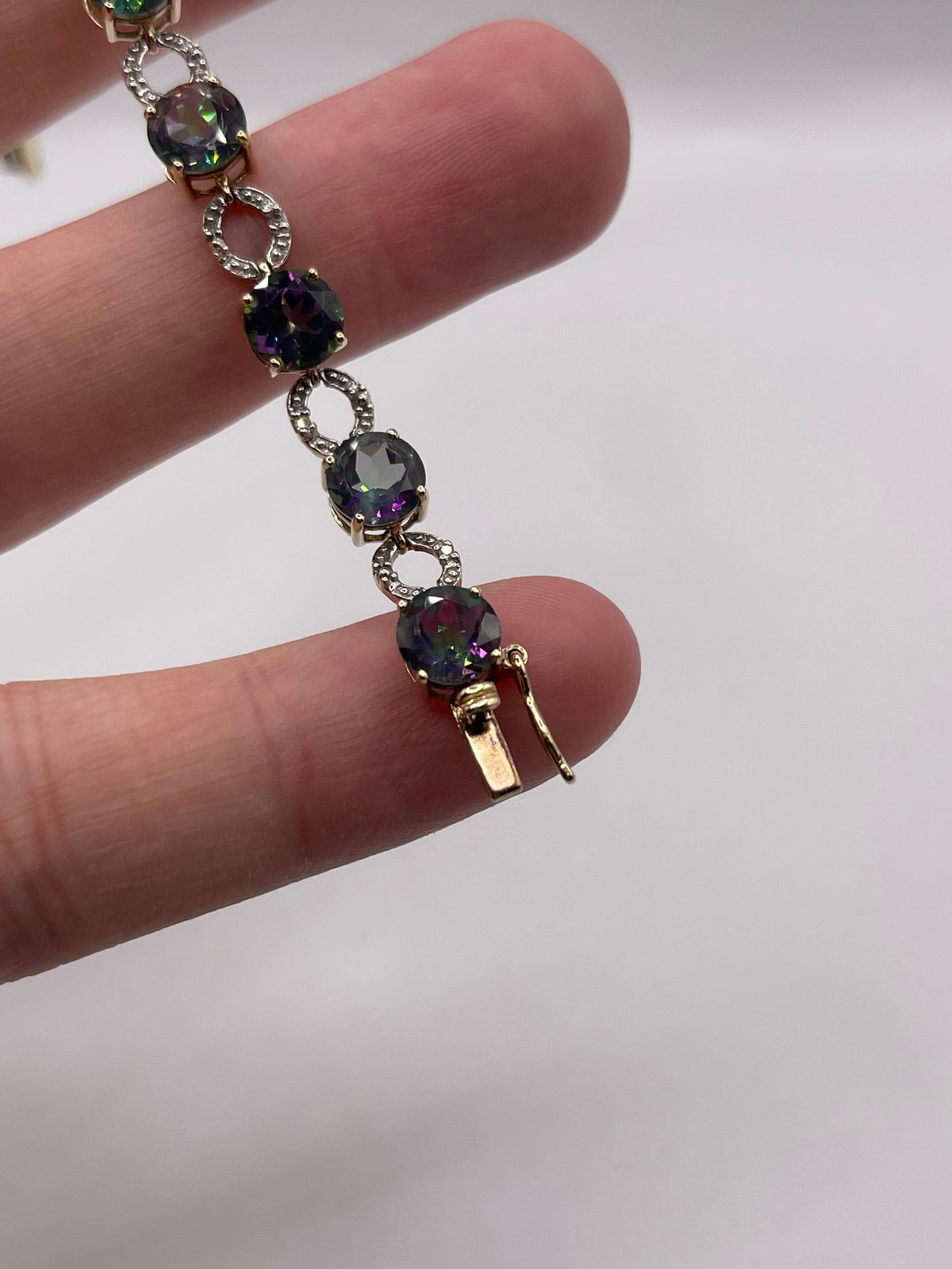 9ct gold mystic topaz and diamond bracelet