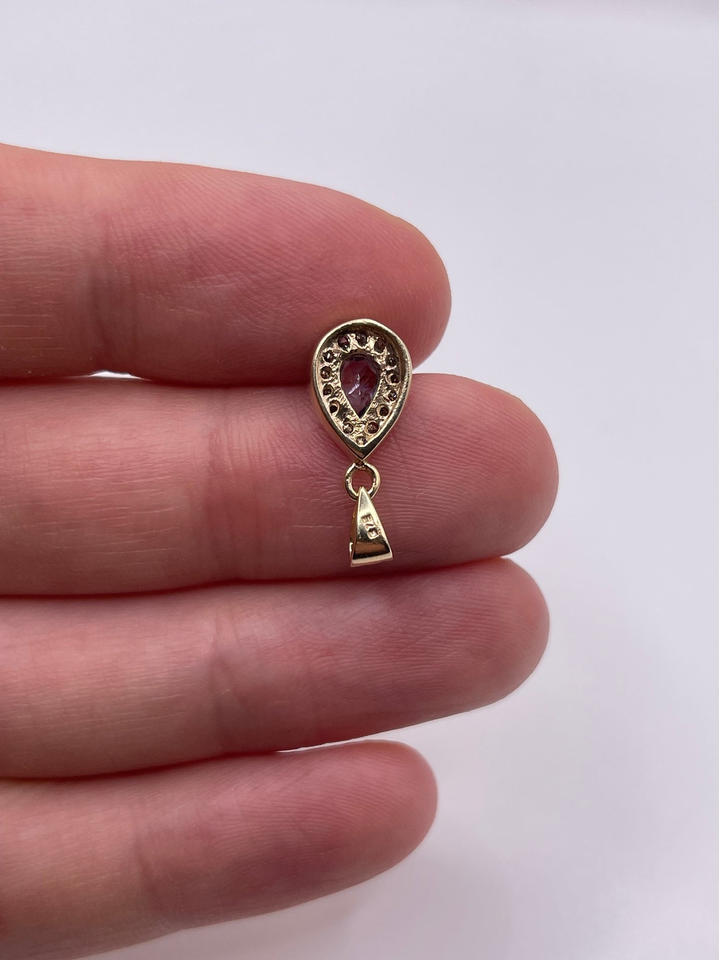 9ct gold tanzanite and diamond pendant