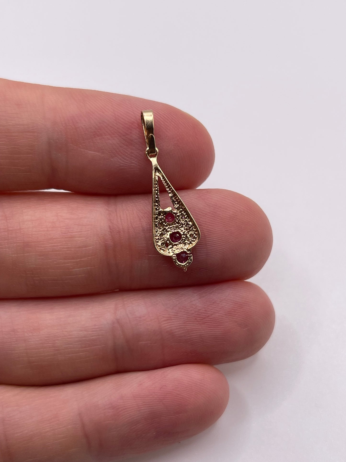 9ct gold ruby and diamond pendant