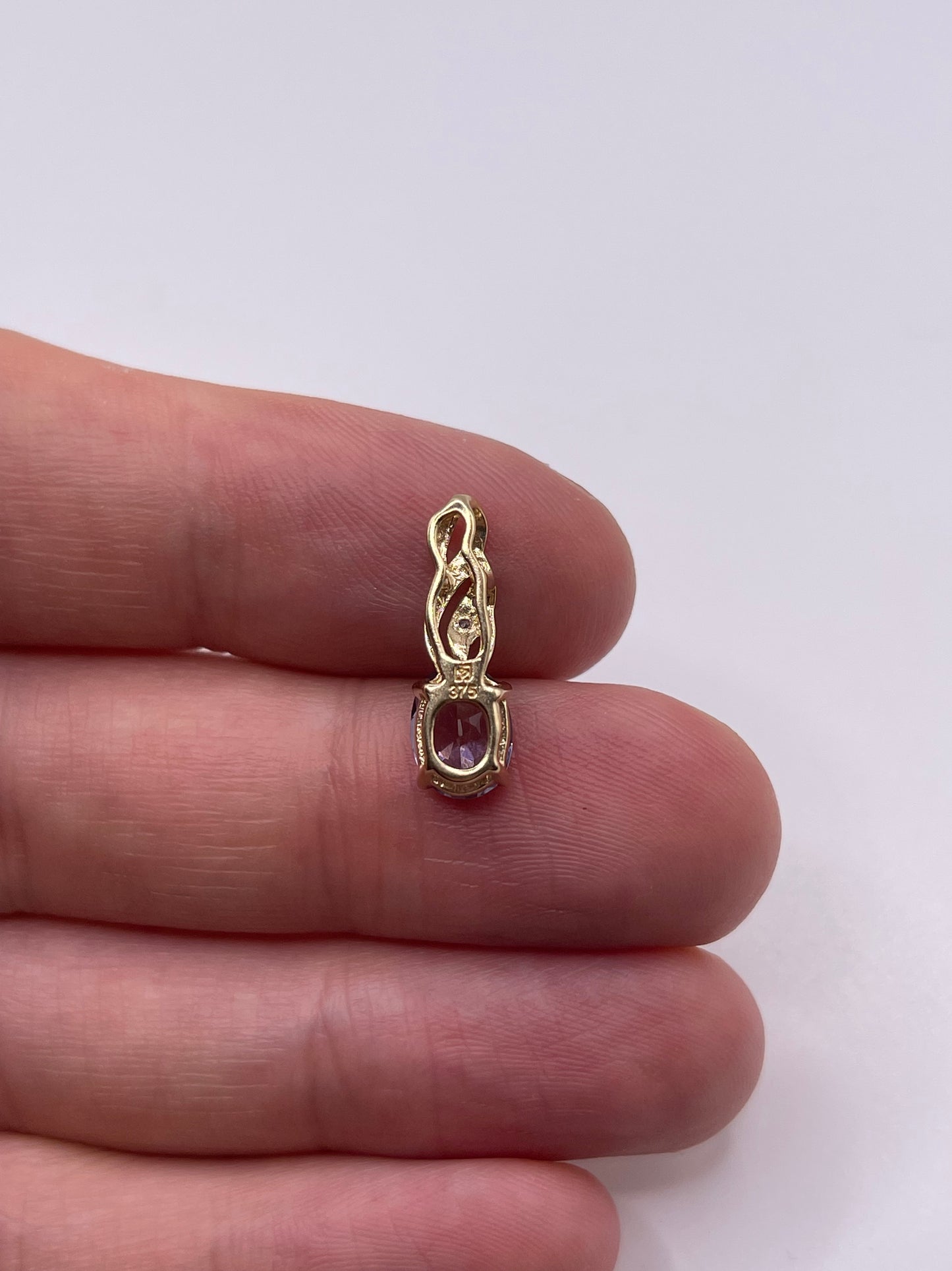 9ct gold iolite and diamond pendant