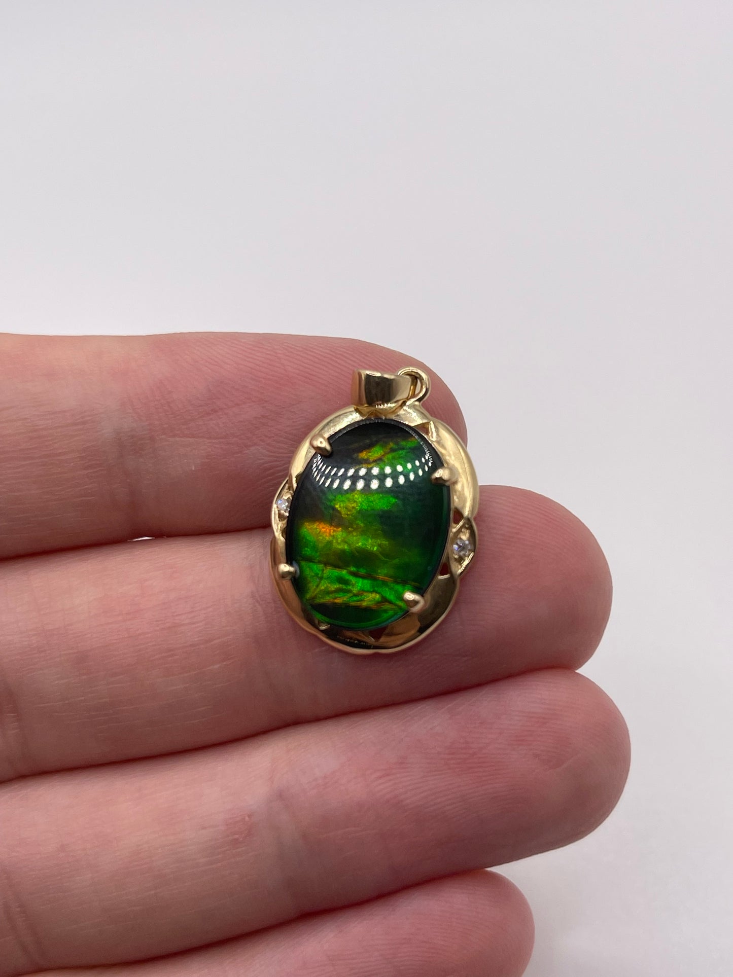 14ct gold ammolite and diamond pendant