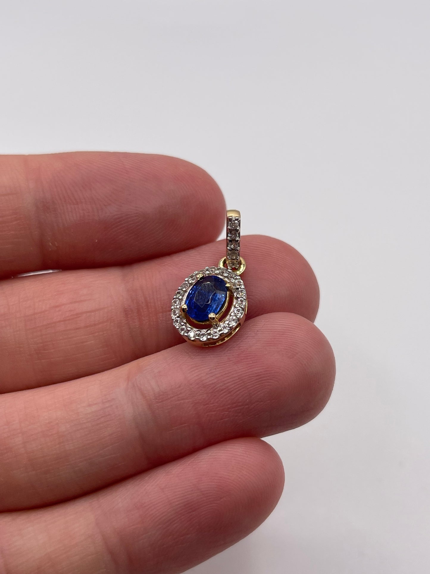 9ct gold kyanite and zircon pendant