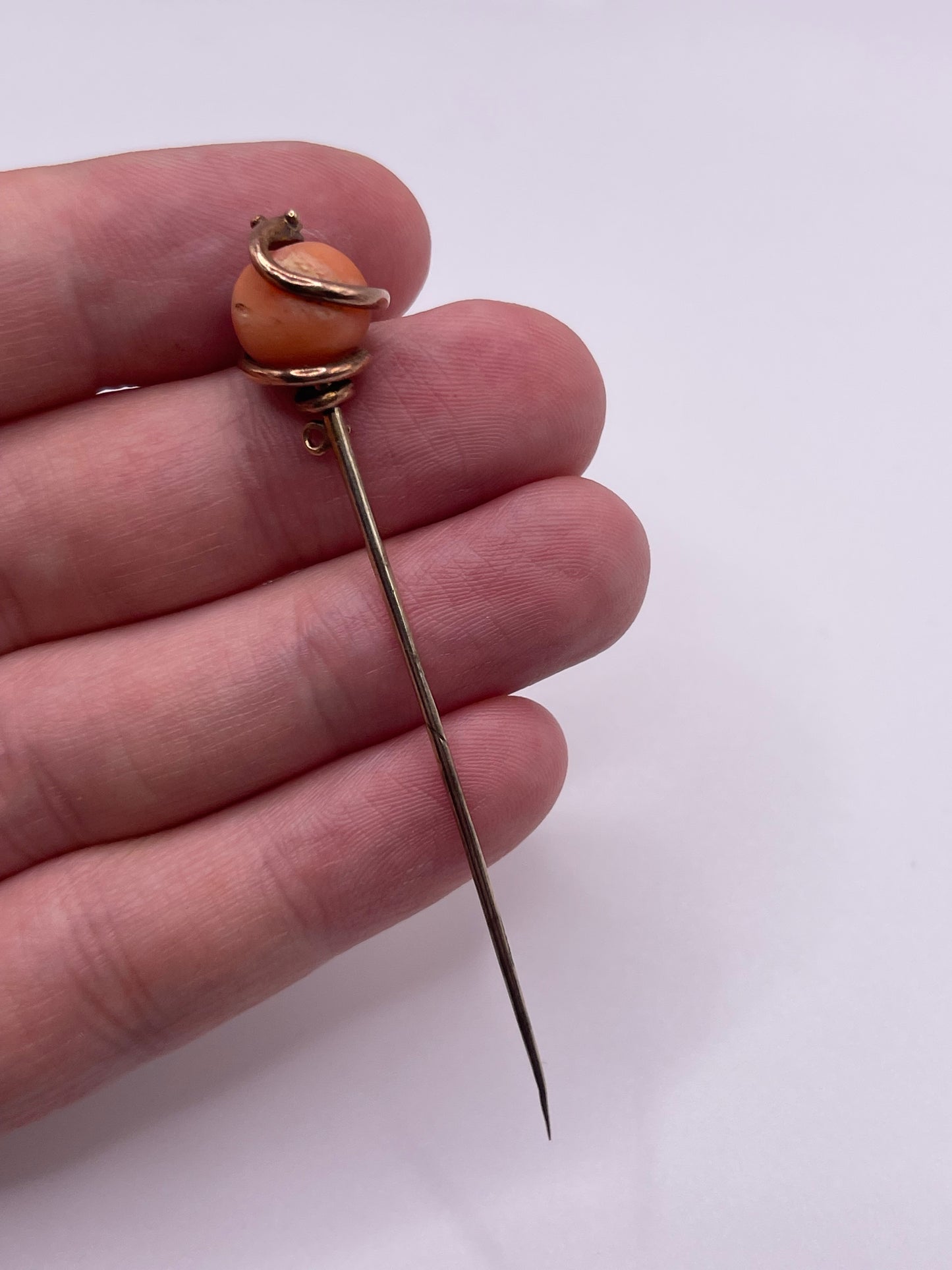 Antique 9ct gold coral snake pin