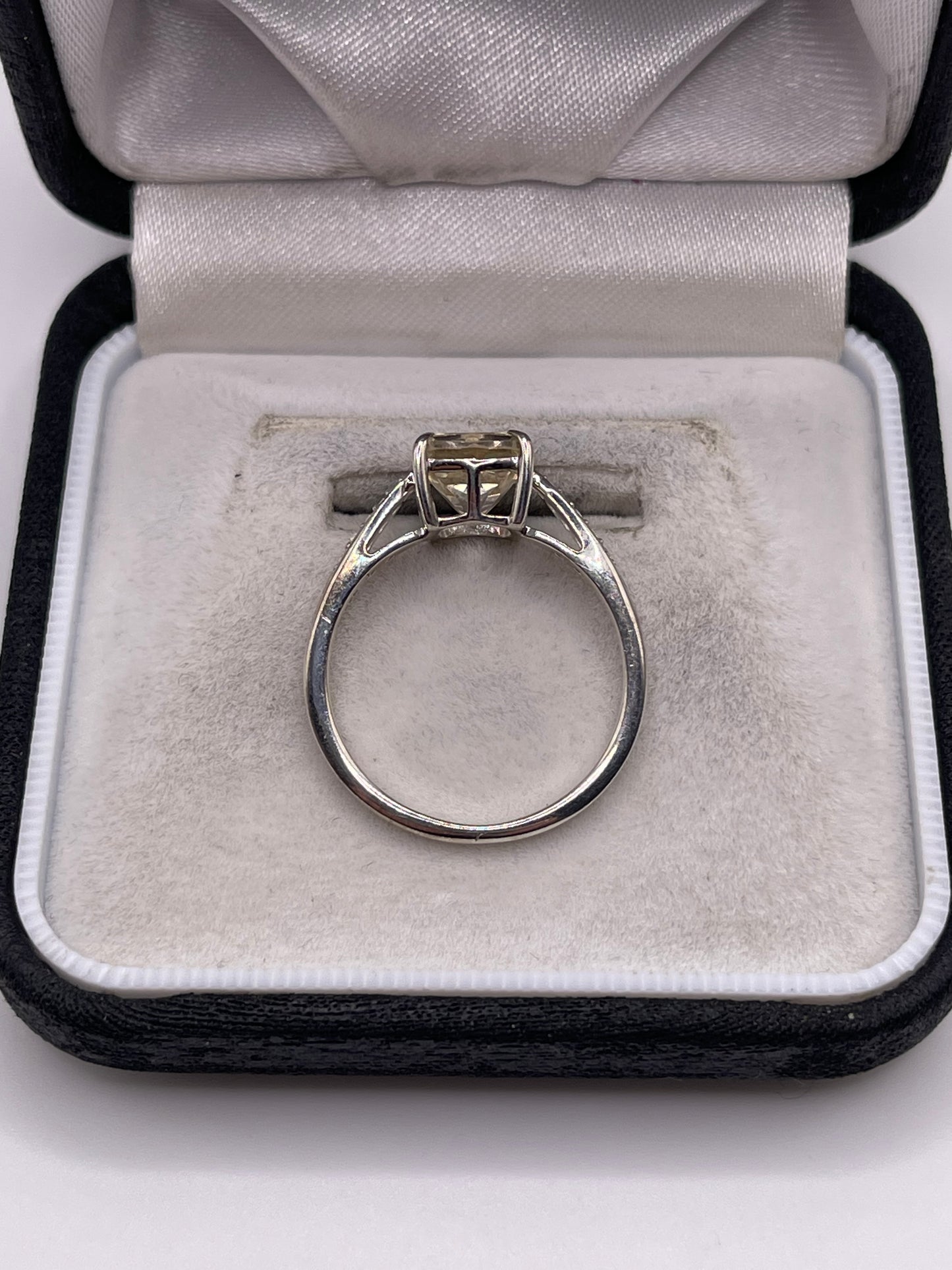 Silver topaz and zircon ring
