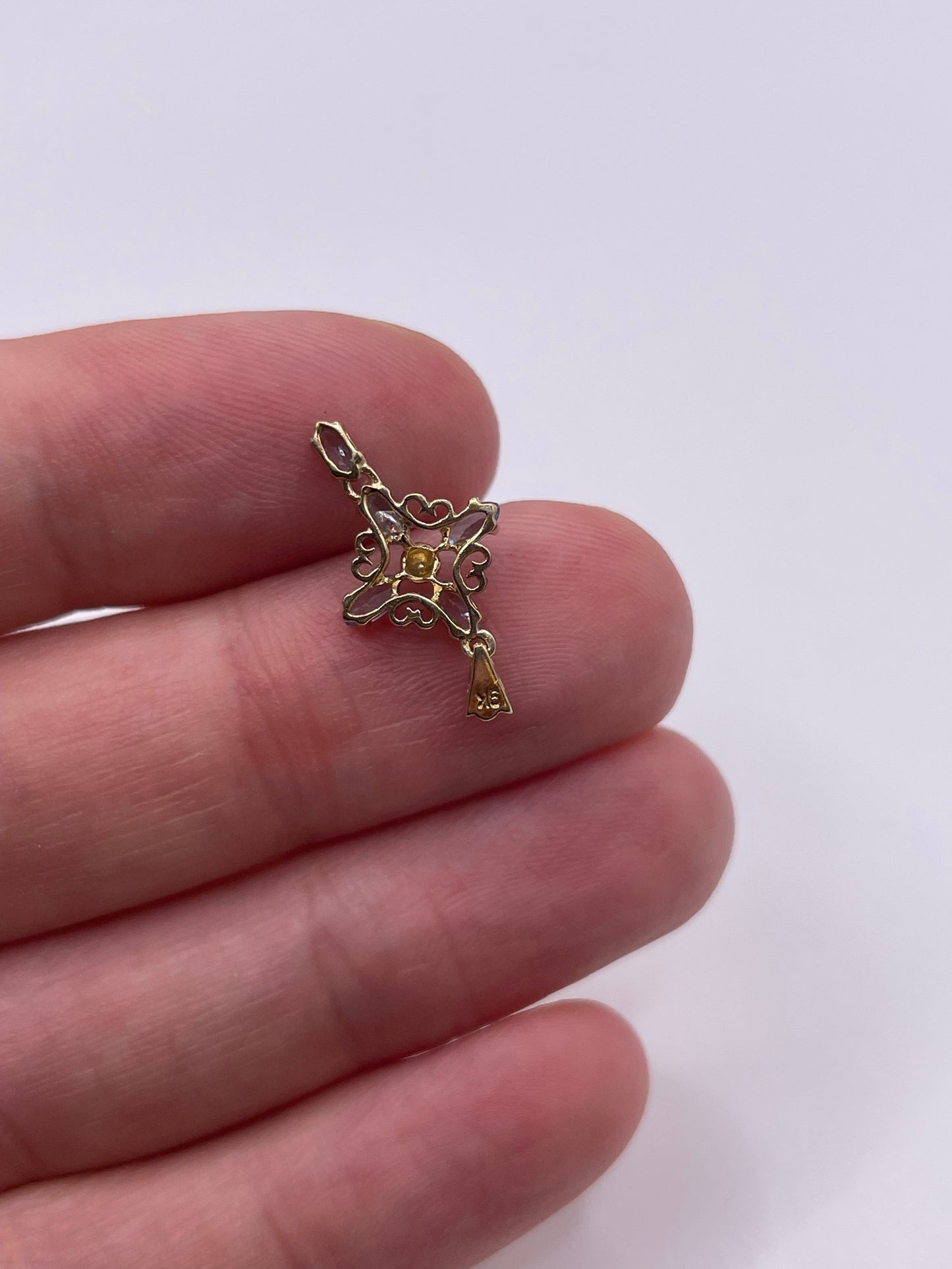9ct gold blue topaz cross pendant