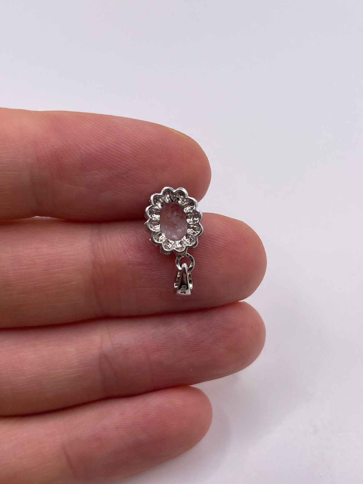 9ct white gold aquamarine and diamond pendant