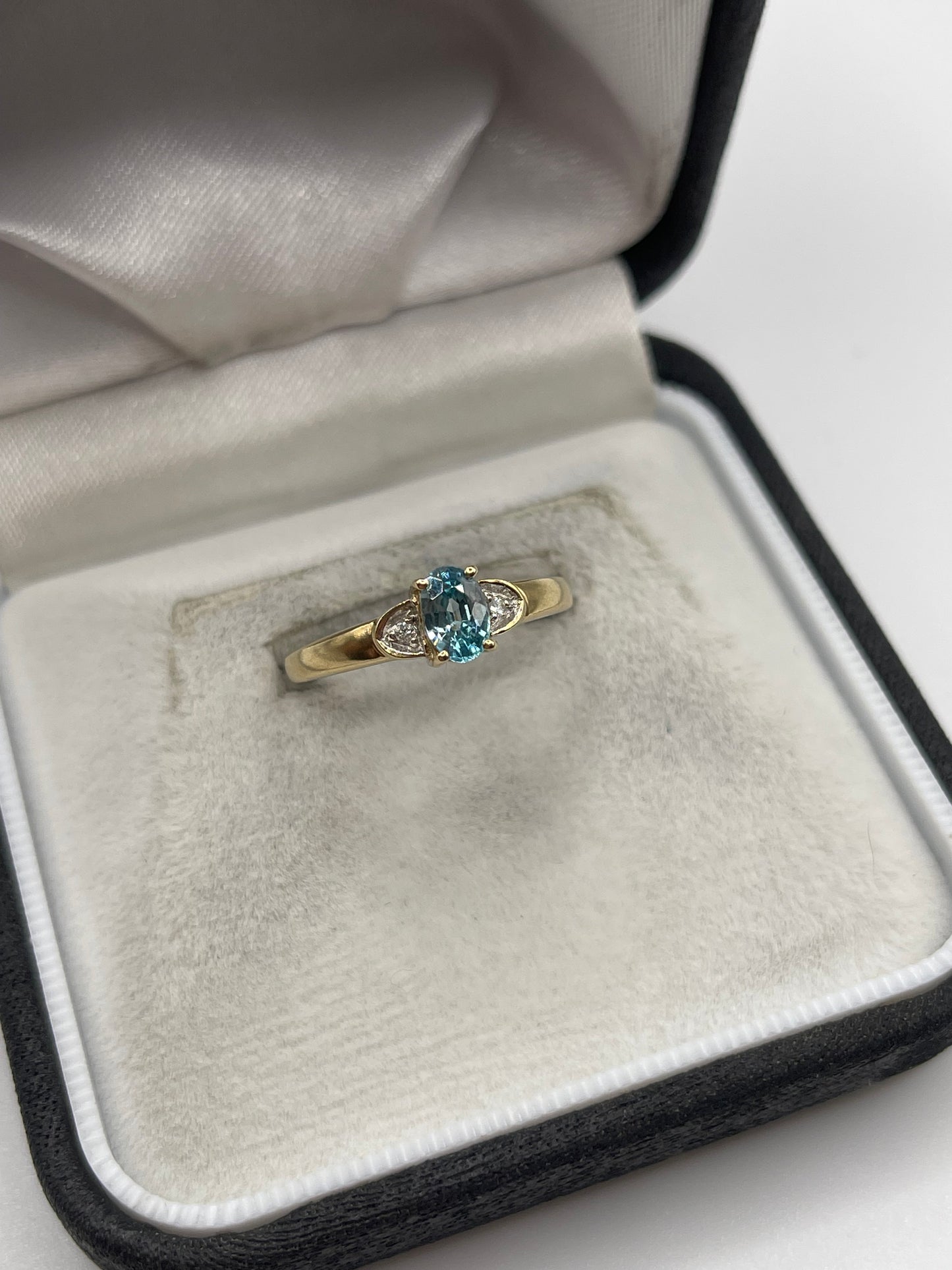 9ct gold blue zircon and diamond ring