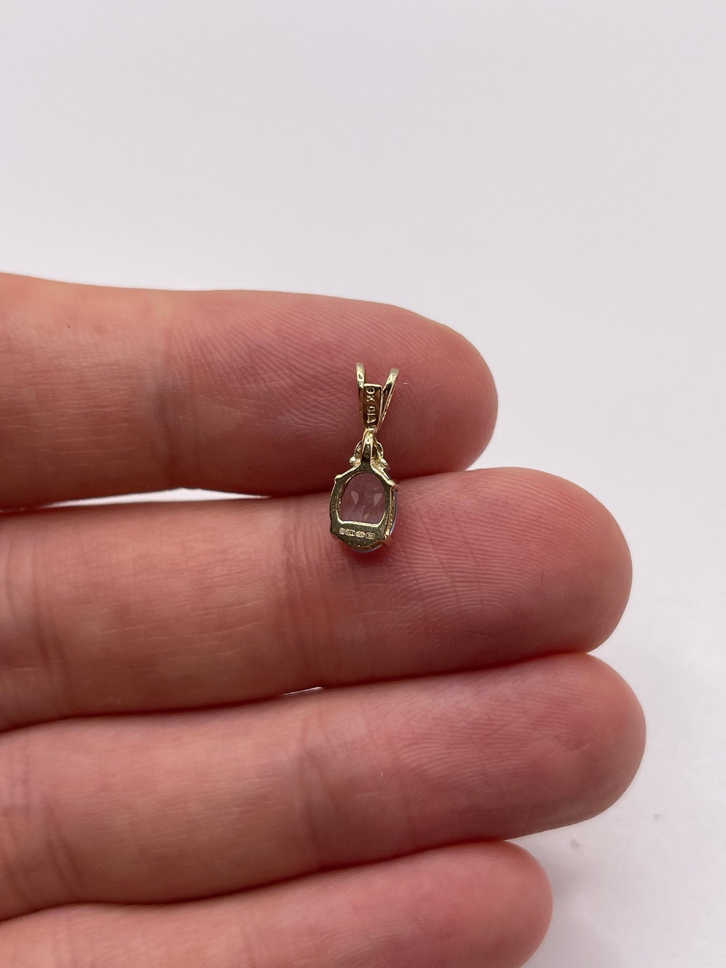 9ct gold topaz and diamond pendant