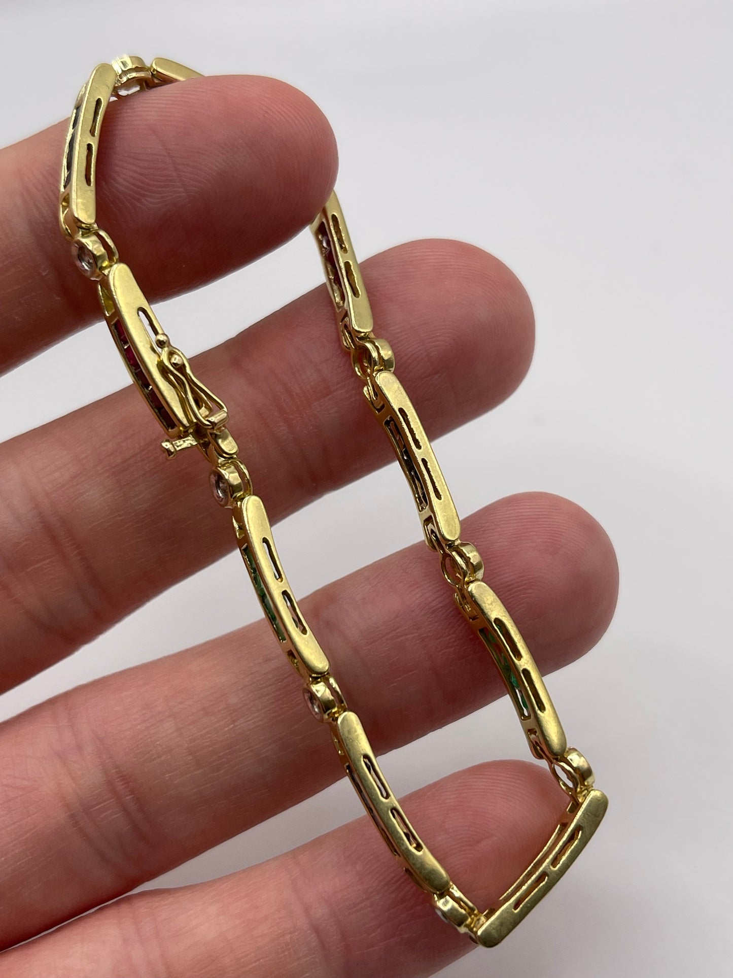 14ct gold ruby, sapphire, emerald and diamond bracelet