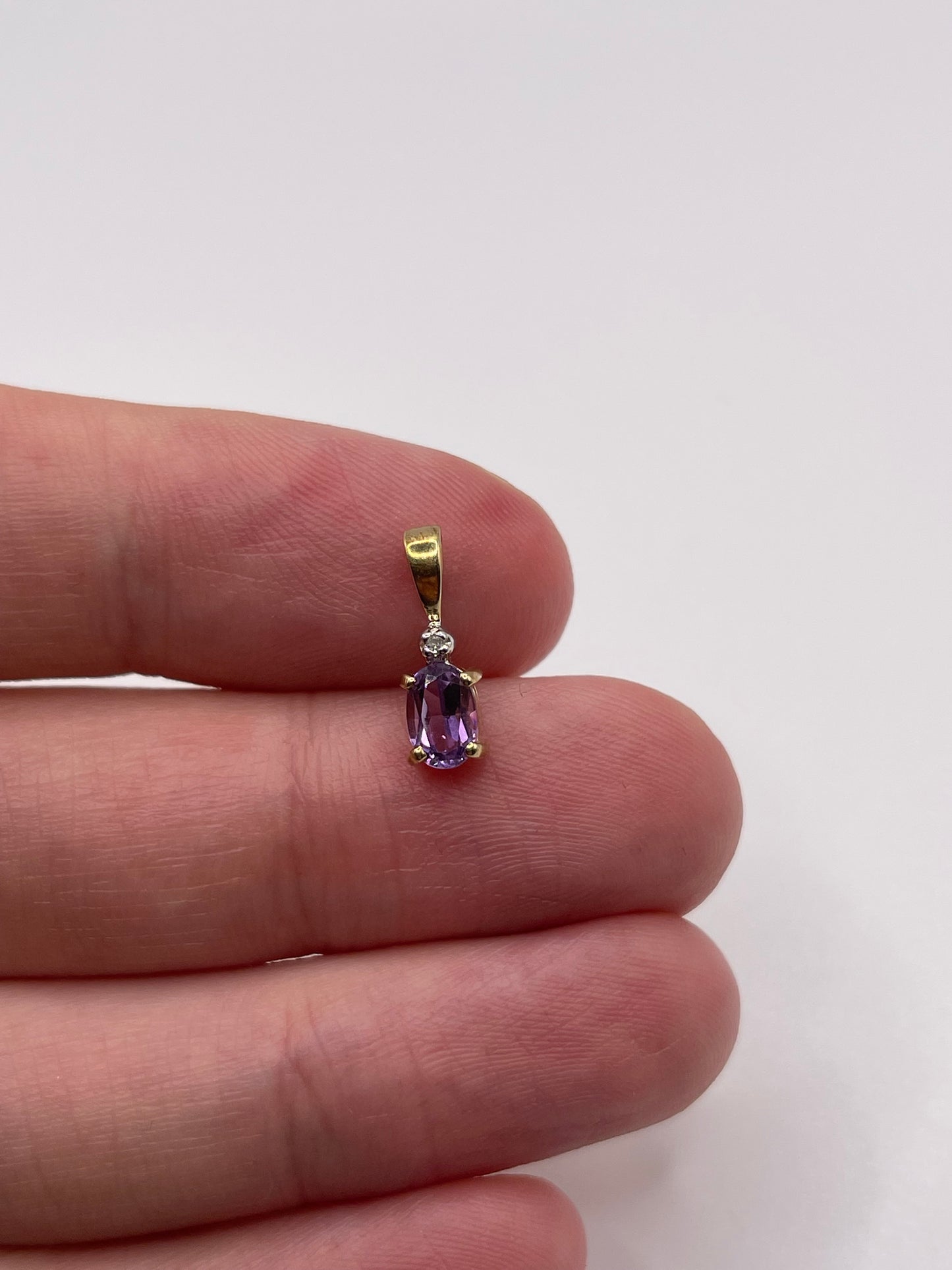 9ct gold amethyst and diamond pendant