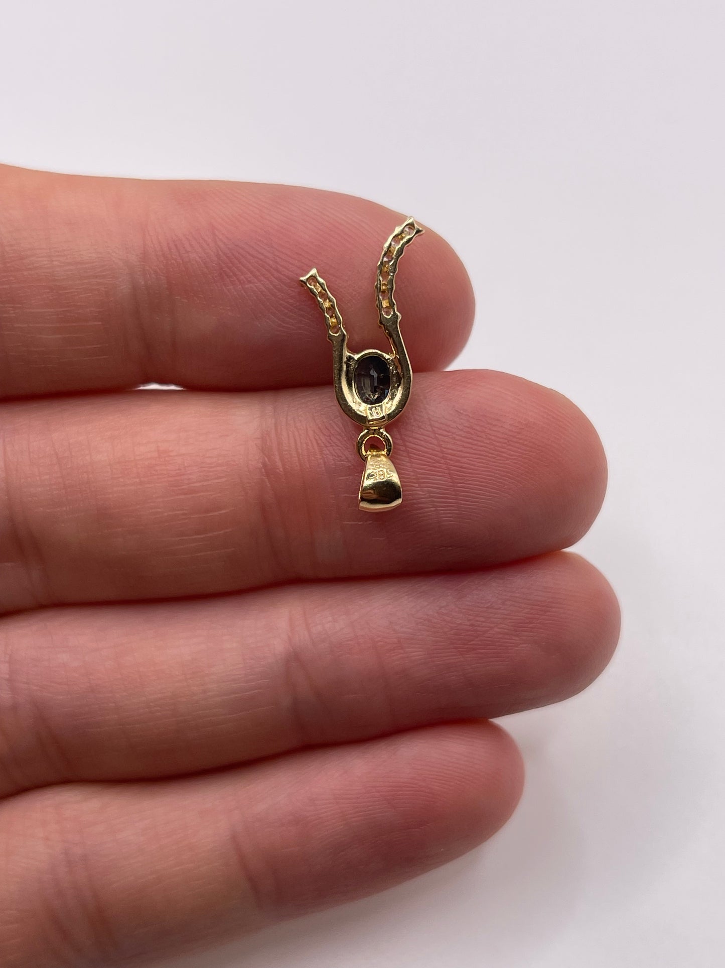 14ct gold sapphire and zircon pendant