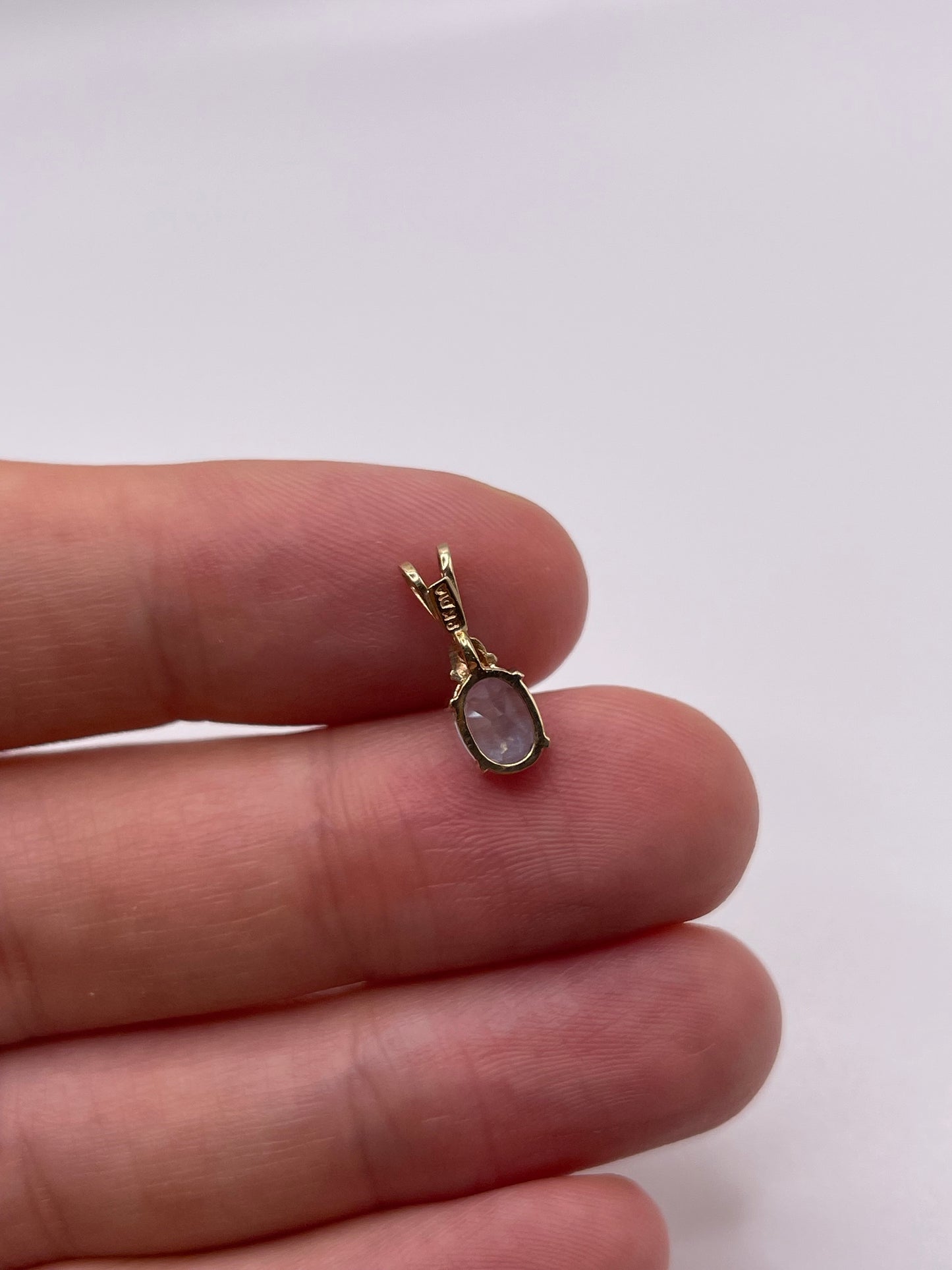 9ct gold topaz and diamond pendant