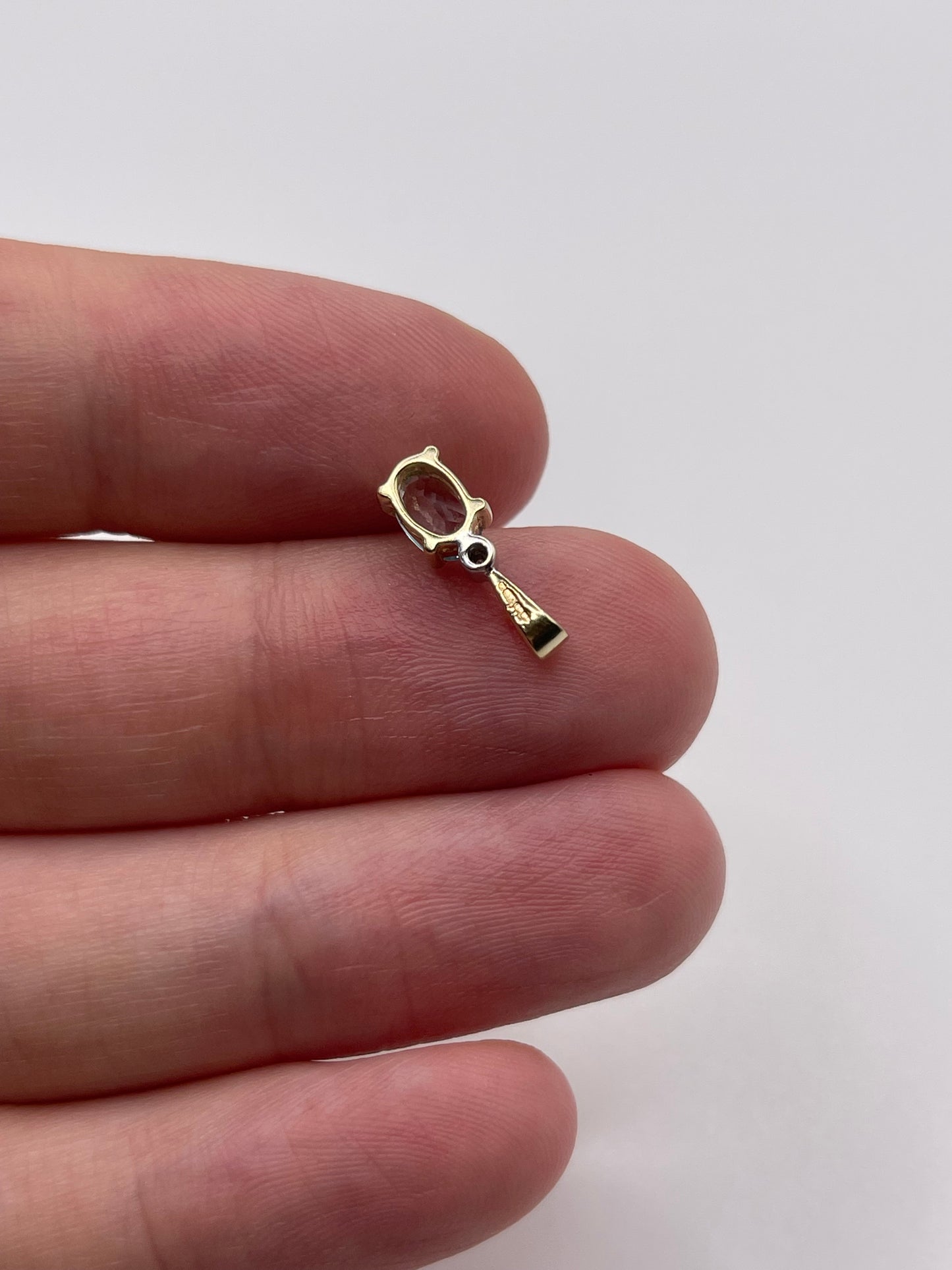 9ct gold topaz and diamond pendant