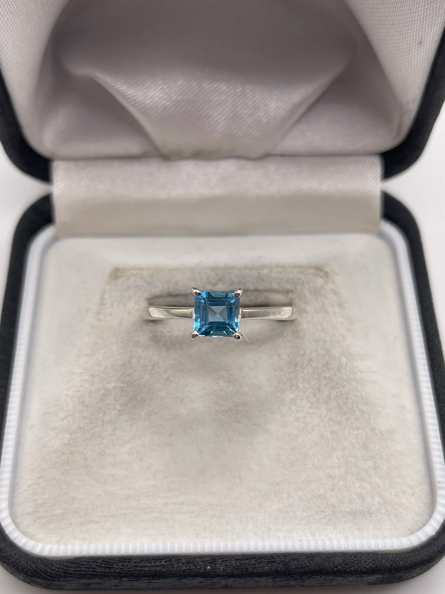 Silver topaz ring