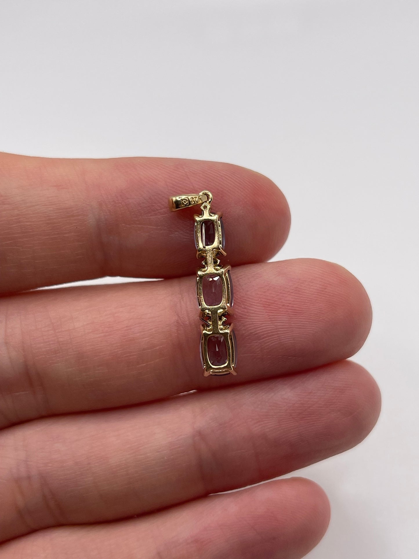 9ct gold iolite and diamond pendant