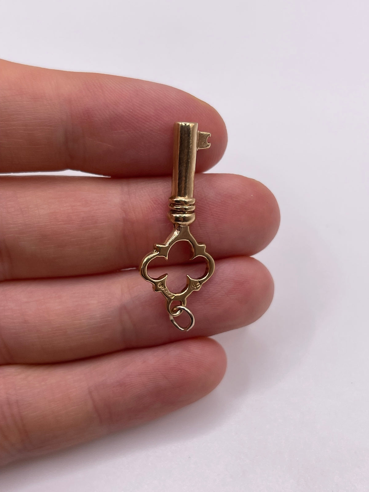 9ct gold watch key pendant
