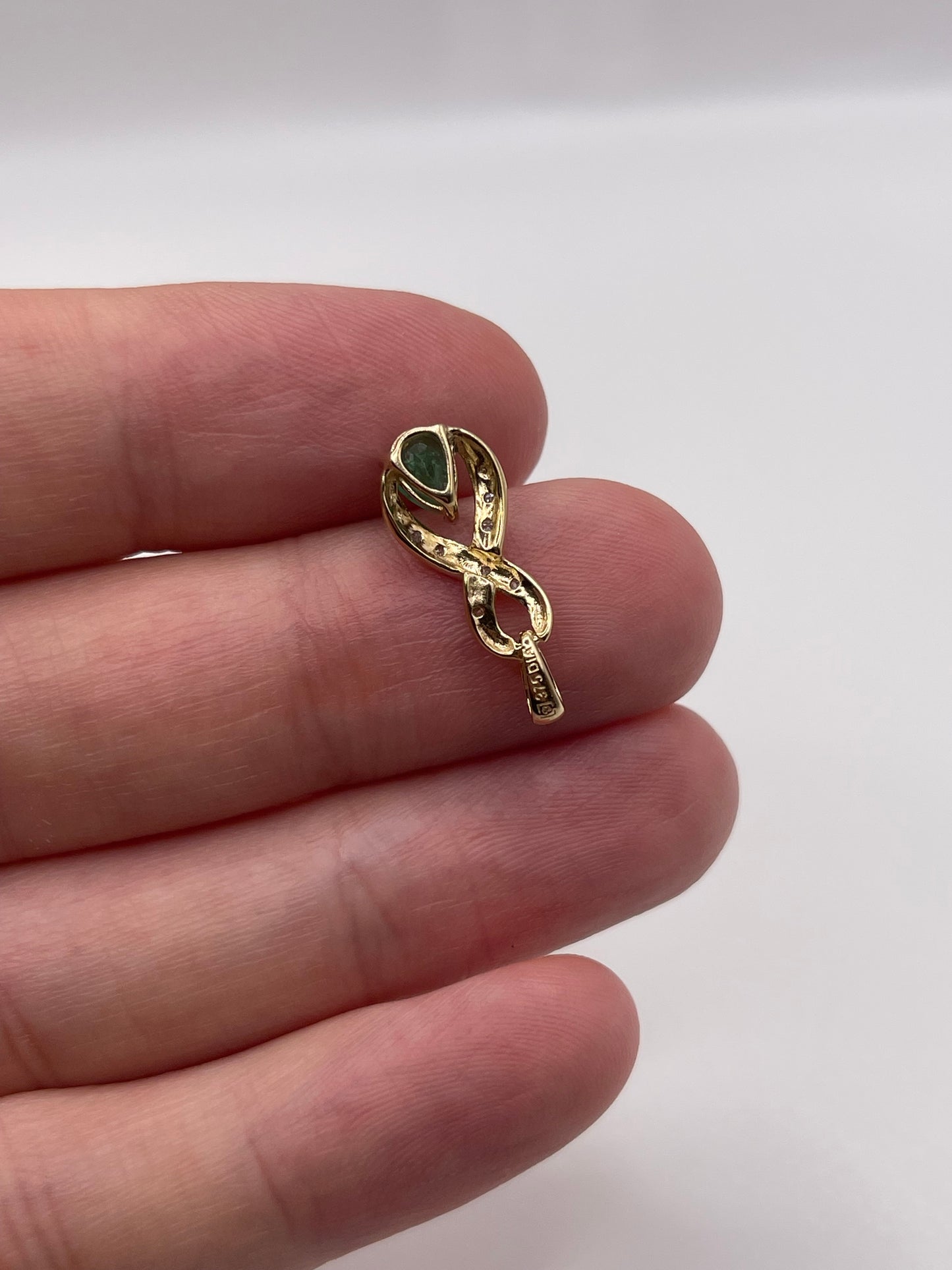 9ct gold emerald and diamond pendant