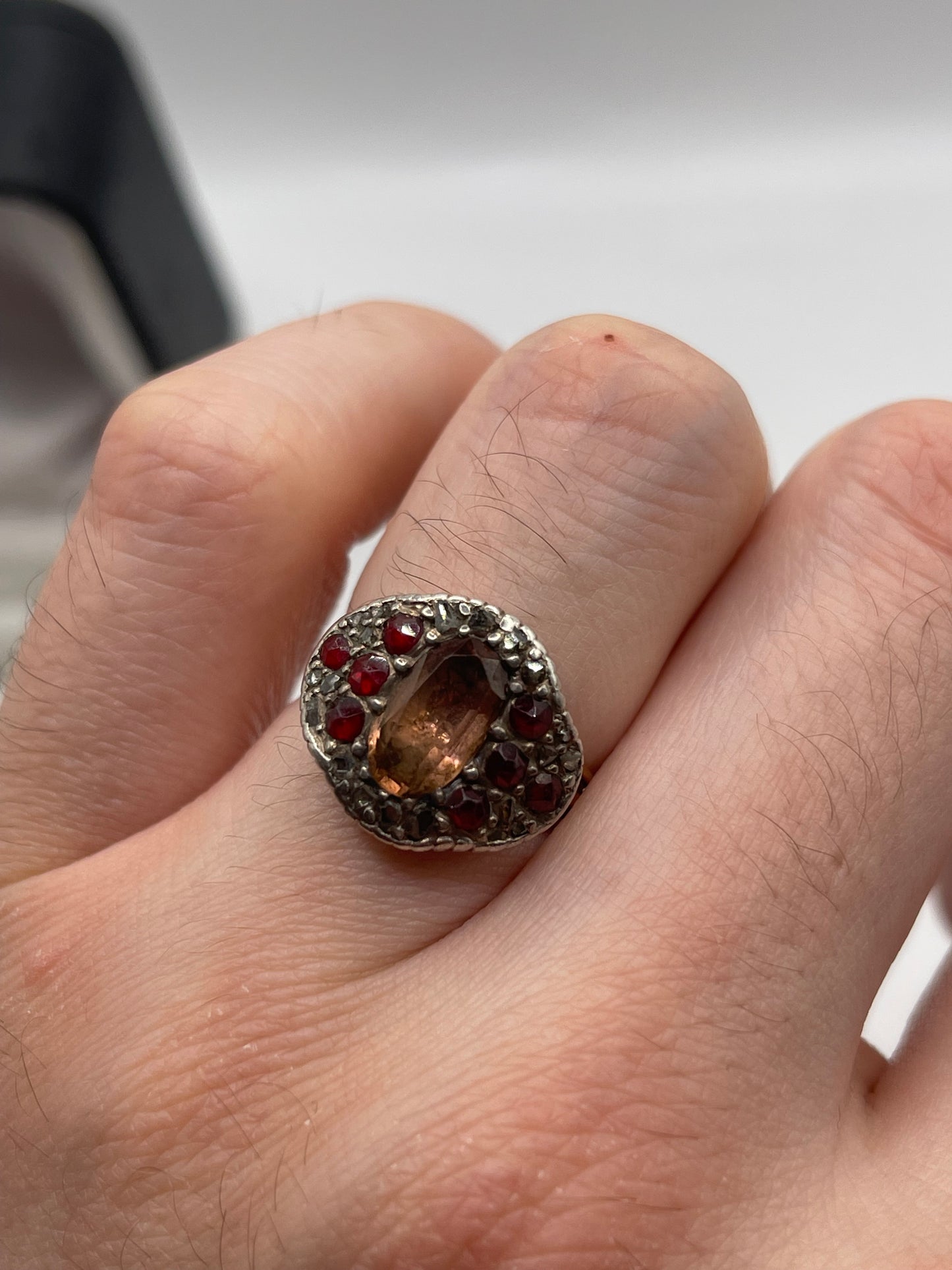 9ct gold and silver topaz, garnet and diamond ring