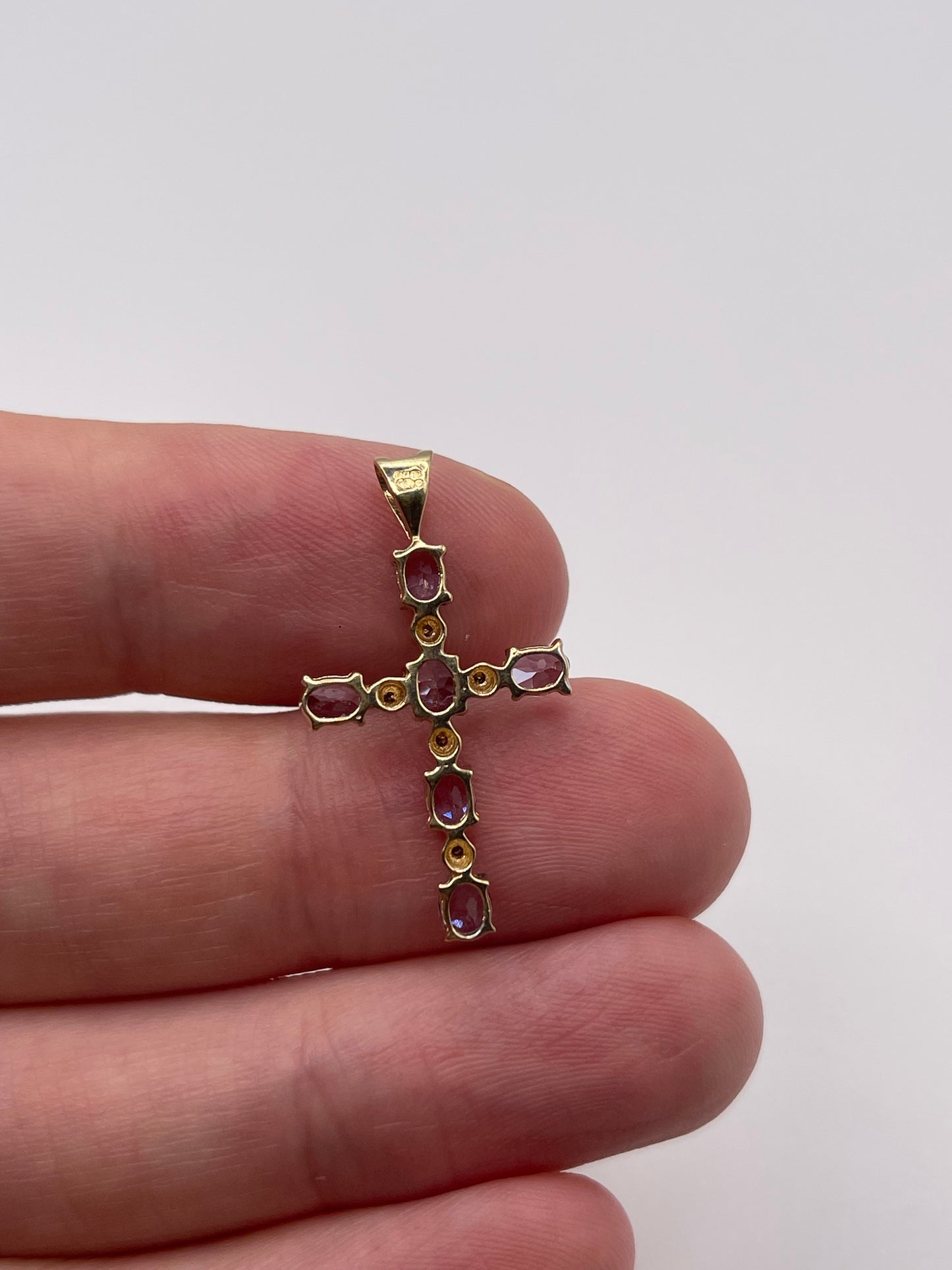 9ct gold tanzanite and diamond cross pendant