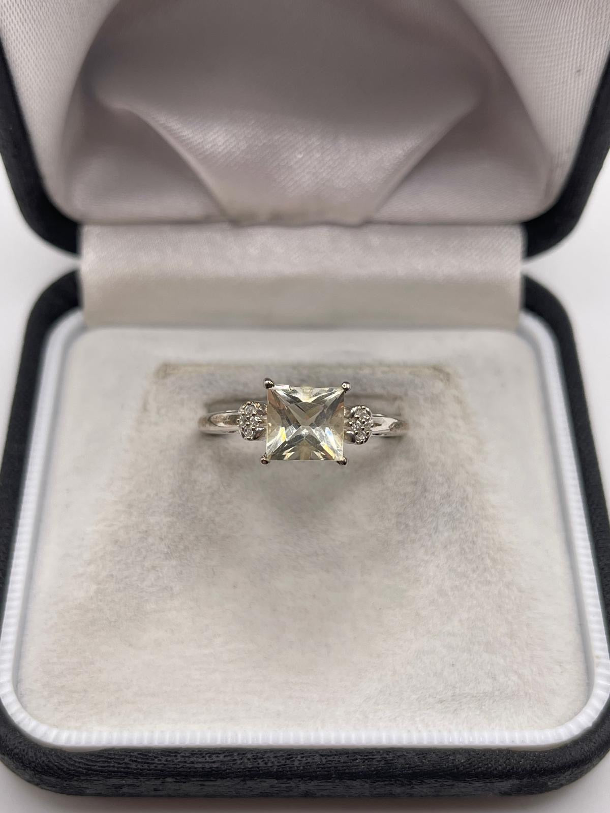 Silver topaz ring