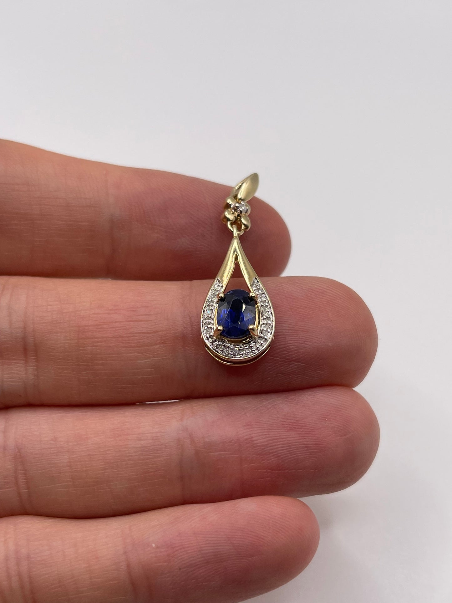 9ct gold kyanite and diamond pendant