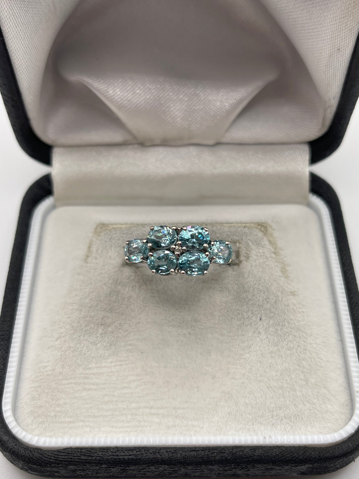 9ct white gold blue zircon and diamond ring