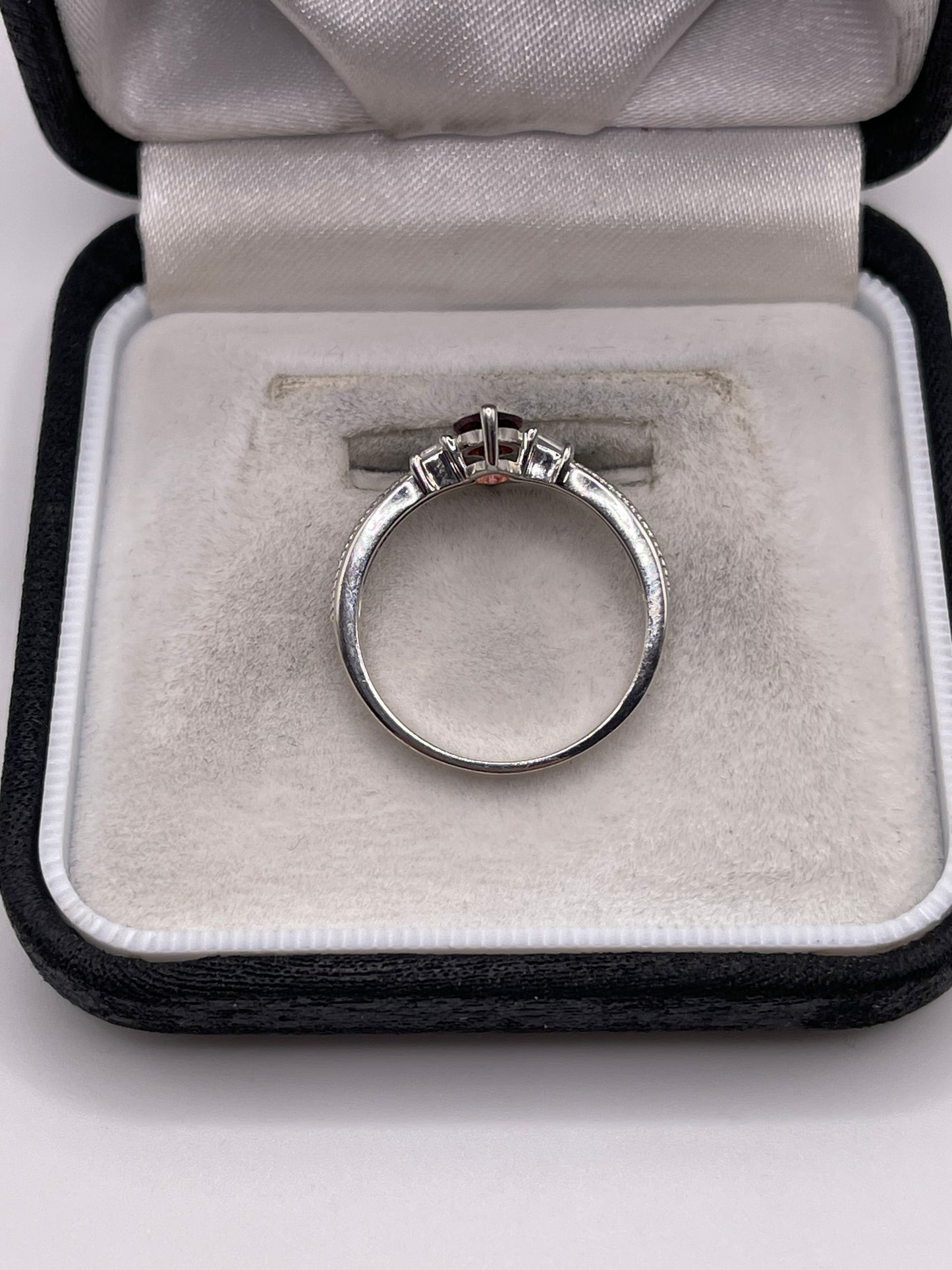 Silver garnet and zircon ring