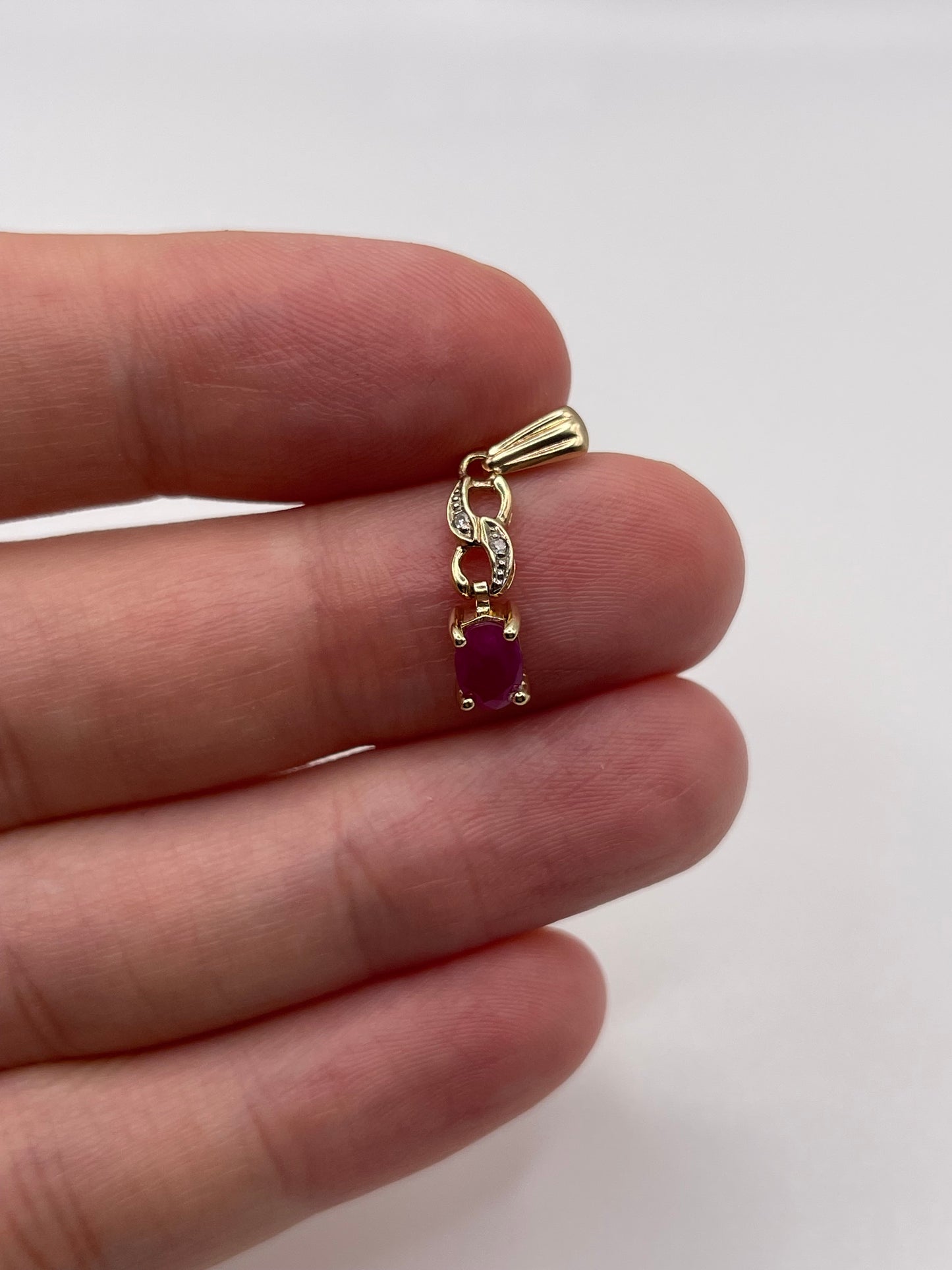 9ct gold ruby and diamond pendant