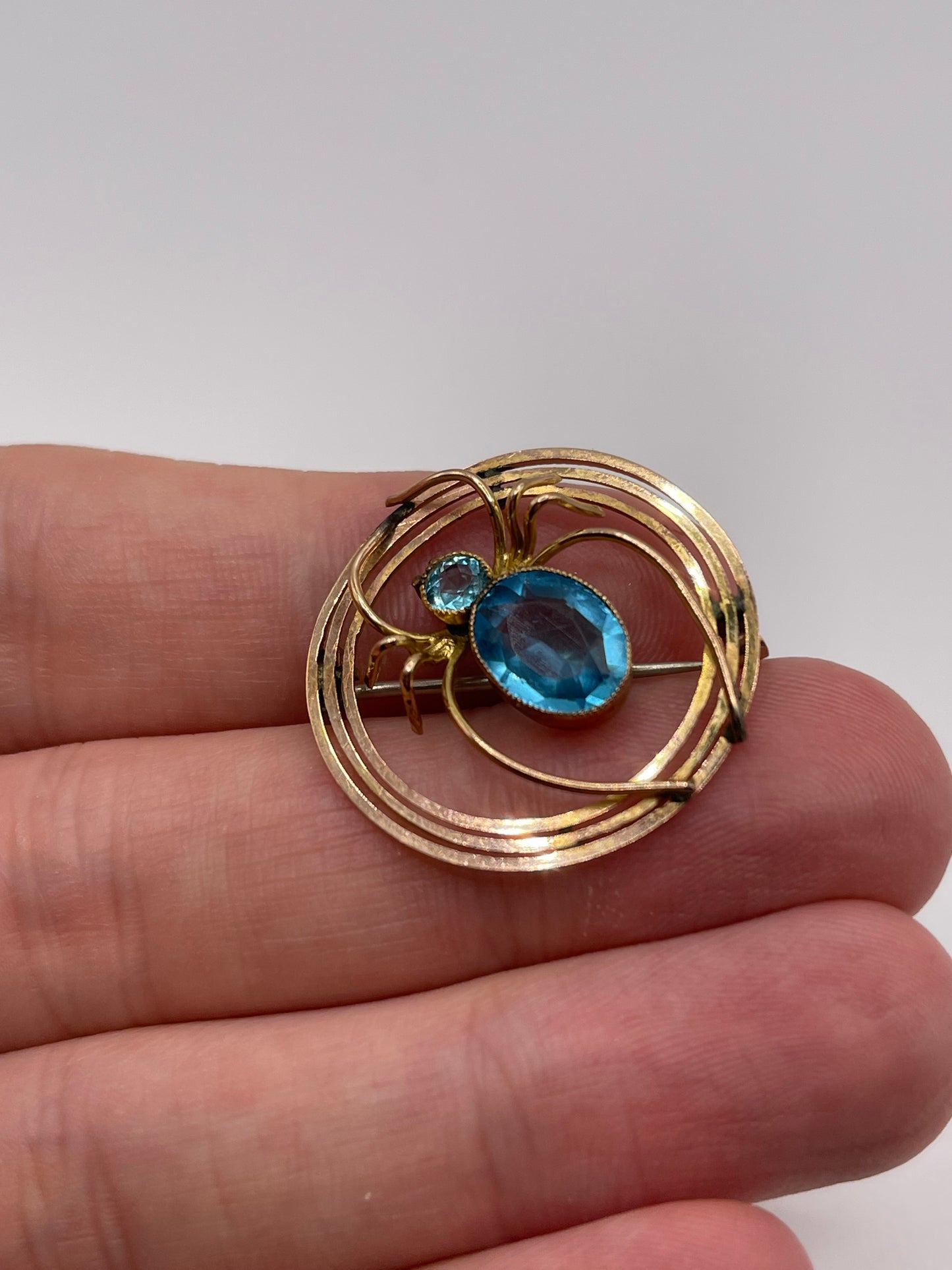 Antique 9ct gold paste spider brooch
